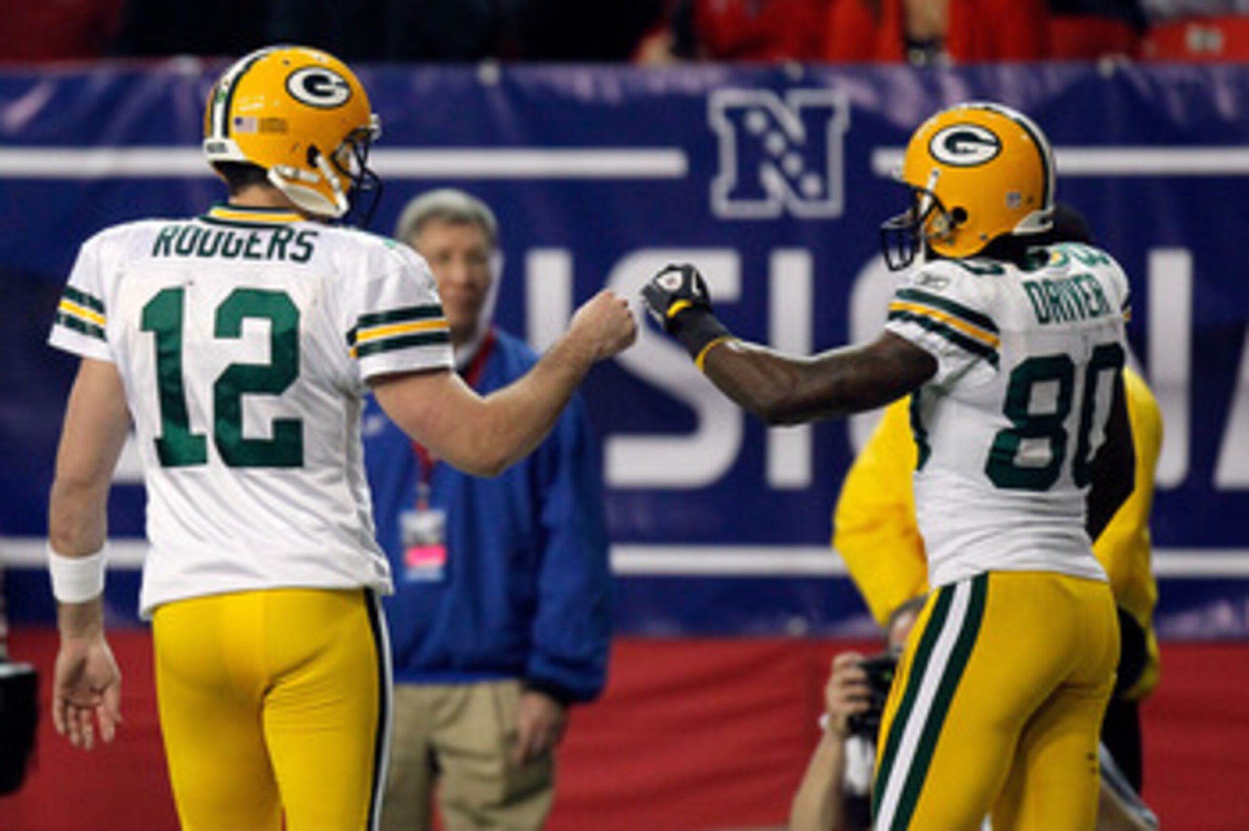 ATLANTA, GA - JANUARY 15: (L-R) Aaron Rodgers #12 and Donald Driver #80 of the Green Bay Packers celebrate a play against the Atlanta Falcons during their 2011 NFC divisional playoff game at Georgia Dome on January 15, 2011 in Atlanta, Georgia. (Photo b ATLANTA, GA - JANUARY 15: (L-R) Aaron Rodgers #12 and Donald Driver #80 of the Green Bay Packers celebrate a play against the Atlanta Falcons during their 2011 NFC divisional playoff game at Georgia Dome on January 15, 2011 in Atlanta, Georgia. (Photo b