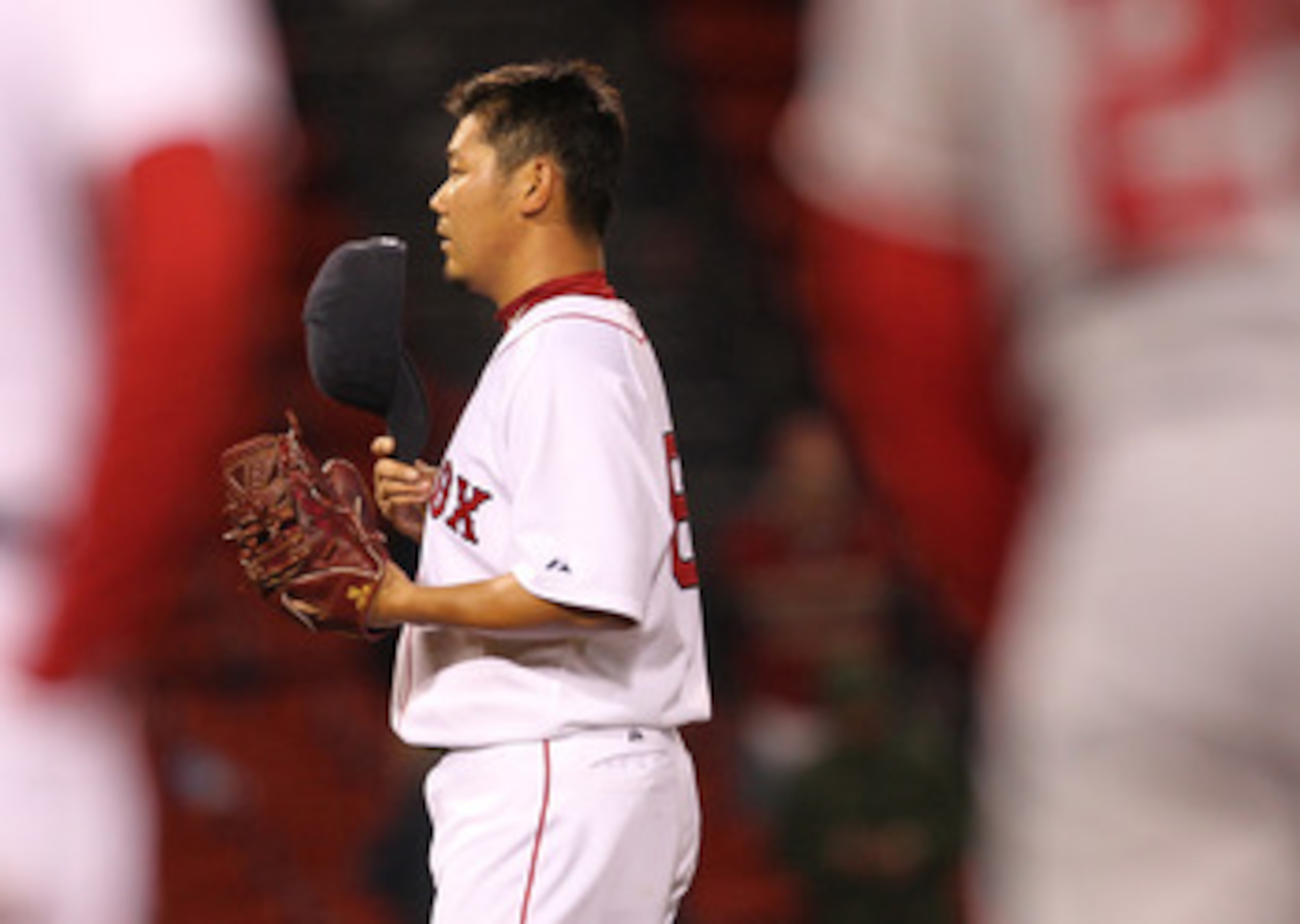 BOSTON, MA - MAY 04: Daisuke Matsuzaka #18 of the Boston Red Sox reacts after giving up a single to Peter Bourjos #25 of the Los Angeles Angels of Anaheim at Fenway Park on May 4, 2011 in Boston, Massachusetts. (Photo by Jim Rogash/Getty Images) BOSTON, MA - MAY 04: Daisuke Matsuzaka #18 of the Boston Red Sox reacts after giving up a single to Peter Bourjos #25 of the Los Angeles Angels of Anaheim at Fenway Park on May 4, 2011 in Boston, Massachusetts. (Photo by Jim Rogash/Getty Images)