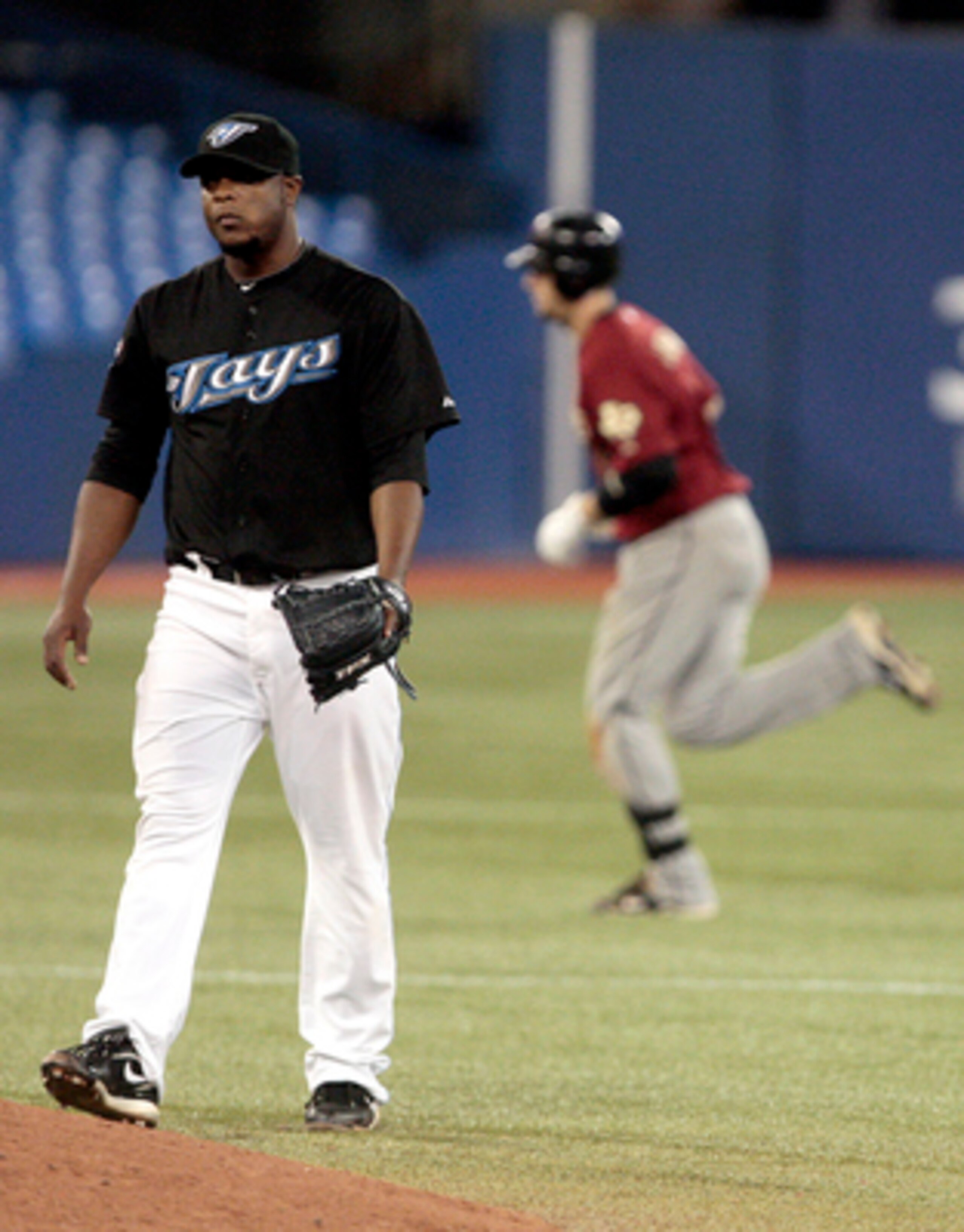 TORONTO, CANADA - MAY 20: Chris Johnson #23 of the Houston Astros rounds the bases after a 2 run home run off of Frank Francisco #50 of the Toronto Blue Jays during MLB action at the Rogers Centre May 20, 2011 in Toronto, Ontario, Canada. (Photo by Abelim