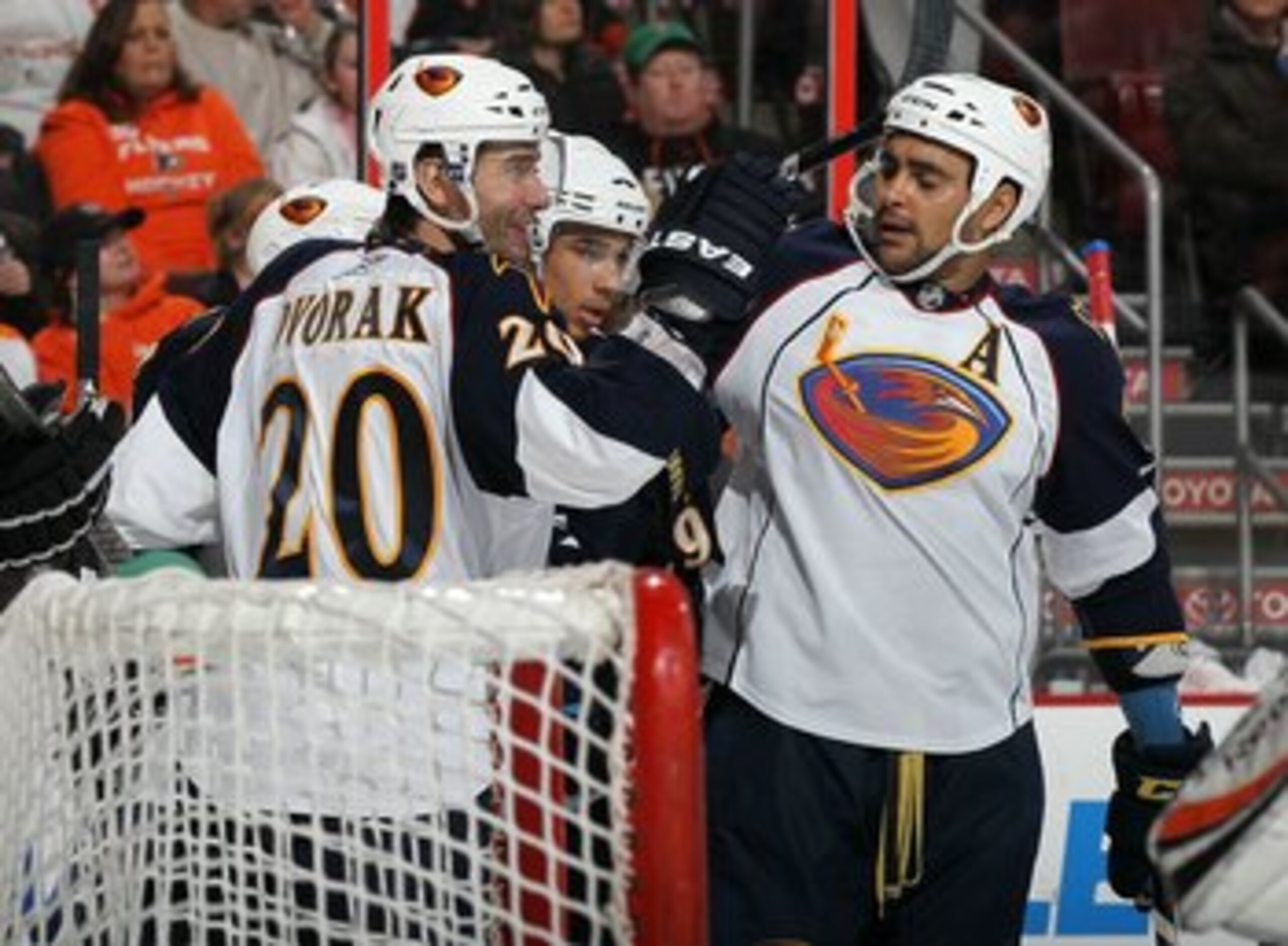 PHILADELPHIA, PA - MARCH 12:  Evander Kane #9 of the Atlanta Thrashers celebrates his goal against the Philadelphia Flyers with teammates Radek Dvorak #20 and Dustin Byfuglien #33 on March 12, 2011 at Wells Fargo Center in Philadelphia, Pennsylvania. The 