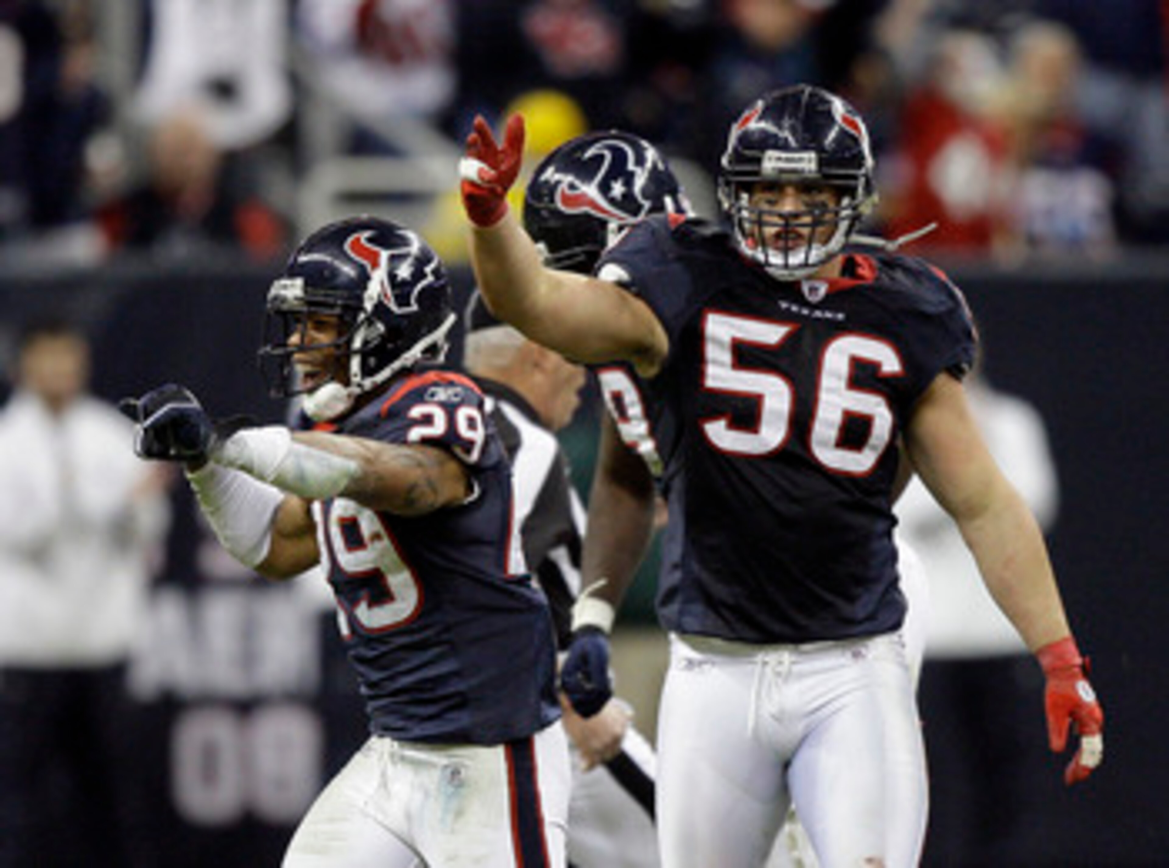 HOUSTON - JANUARY 02:  Glover Quin #29 of the Houston Texans and Brian Cushing #56  celebrate after recovering a fumble late in the fourth quarter against the Jacksonville Jaguars at Reliant Stadium on January 2, 2011 in Houston, Texas.  (Photo by Bob Lev