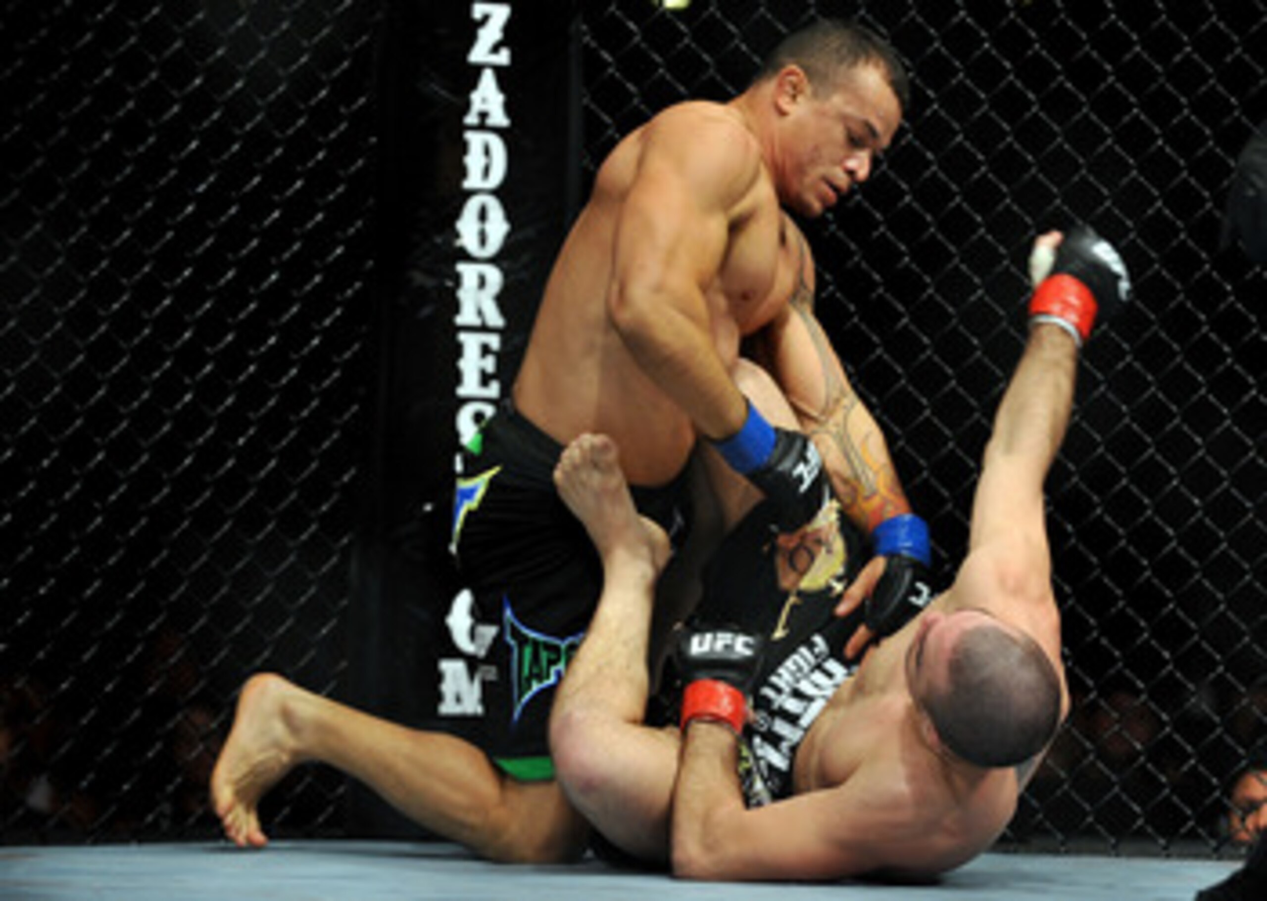 LOS ANGELES, CA - OCTOBER 24: UFC fighter Gleison Tibau (top) battles with UFC fighter Josh Neer during their Lightweight 'Swing' bout at UFC 104: Machida vs. Shogun at Staples Center on October 24, 2009 in Los Angeles, California. (Photo by Jon Kopalof LOS ANGELES, CA - OCTOBER 24: UFC fighter Gleison Tibau (top) battles with UFC fighter Josh Neer during their Lightweight 'Swing' bout at UFC 104: Machida vs. Shogun at Staples Center on October 24, 2009 in Los Angeles, California. (Photo by Jon Kopalof