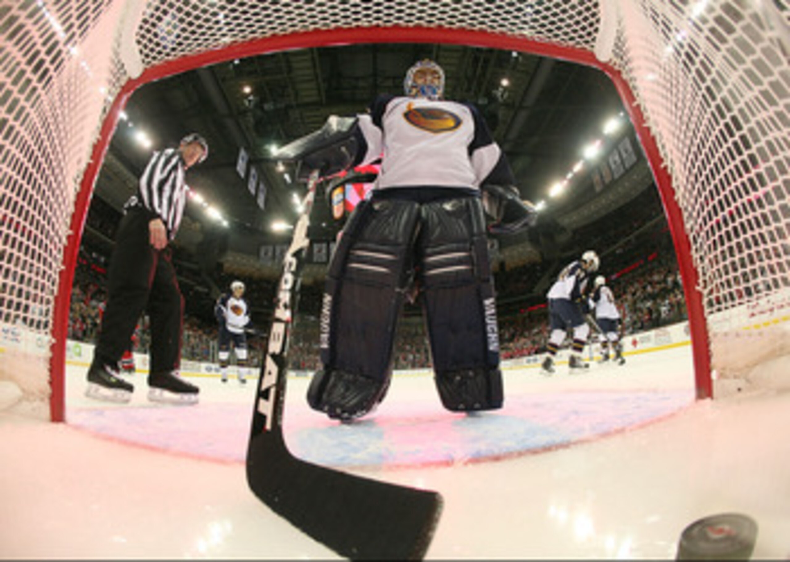 NEWARK, NJ - MARCH 15: Ondrej Pavelec #31 of the Atlanta Thrashers fishes the puck out of the net following a goal at 4:14 of the third period at the Prudential Center on March 15, 2011 in Newark, New Jersey. The Devils defeated the Thrashers 4-2.  (Photo