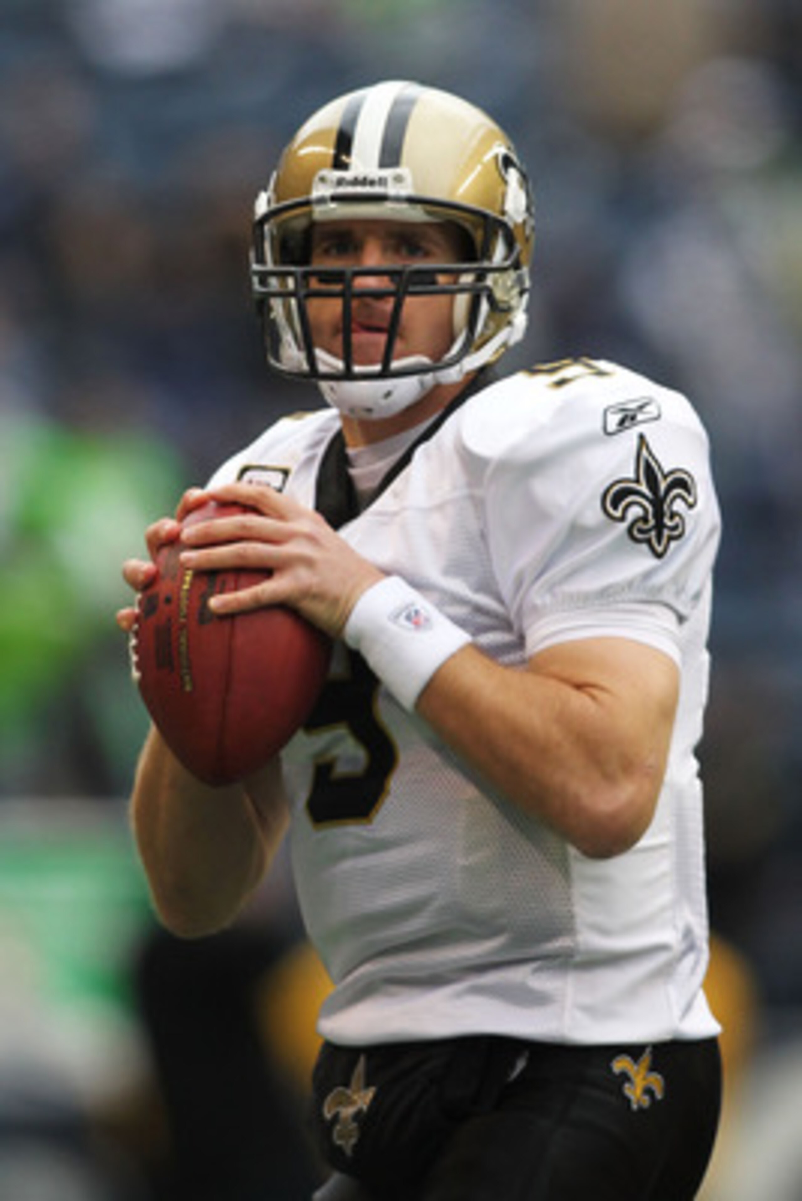 SEATTLE, WA - JANUARY 08: Quarterback Drew Brees #9 of the New Orleans Saints scrambles against the Seattle Seahawks during the 2011 NFC wild-card playoff game at Qwest Field on January 8, 2011 in Seattle, Washington. (Photo by Jonathan Ferrey/Getty Ima SEATTLE, WA - JANUARY 08: Quarterback Drew Brees #9 of the New Orleans Saints scrambles against the Seattle Seahawks during the 2011 NFC wild-card playoff game at Qwest Field on January 8, 2011 in Seattle, Washington. (Photo by Jonathan Ferrey/Getty Ima