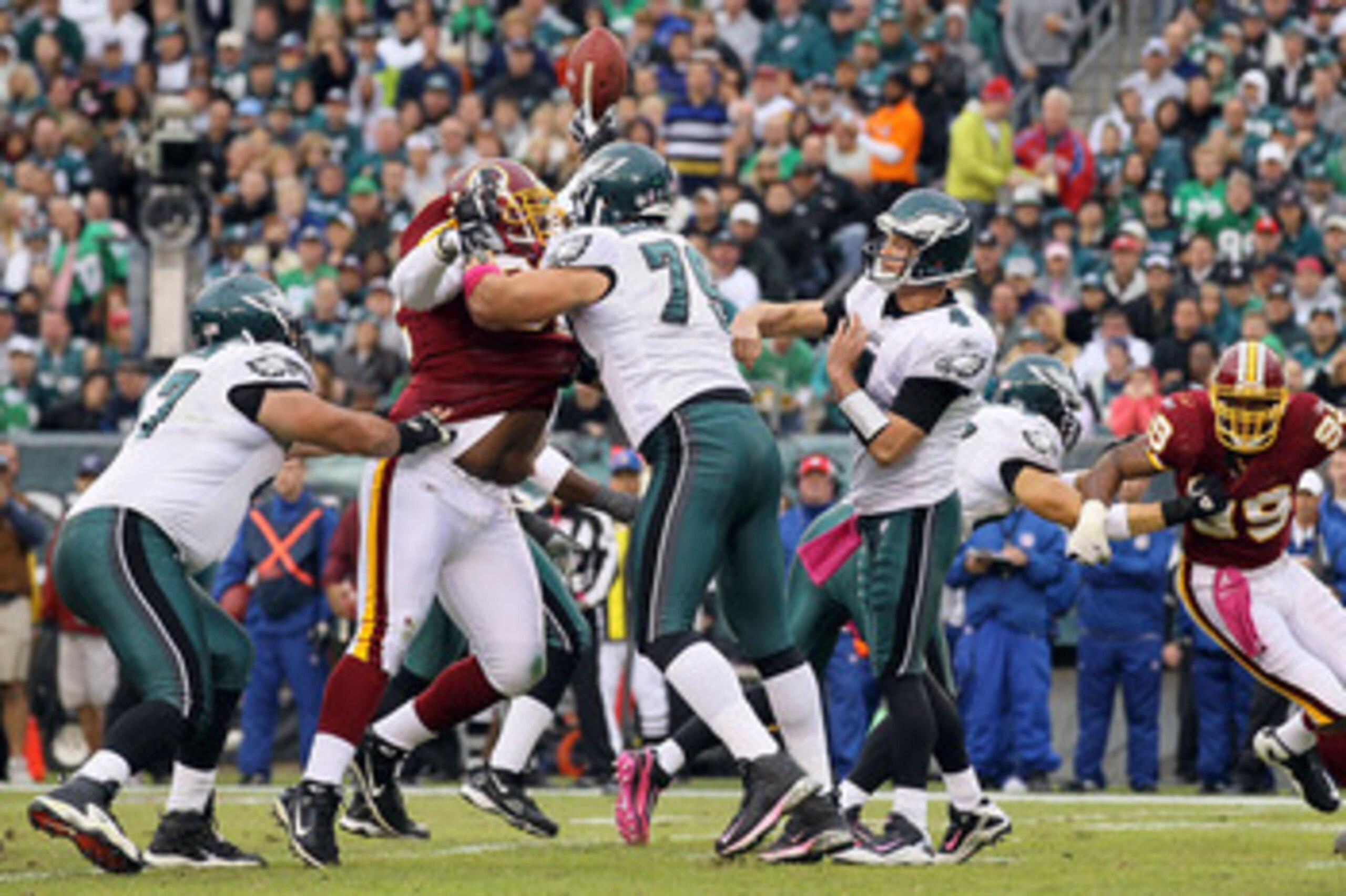 PHILADELPHIA - OCTOBER 03:  Kevin Kolb #4 of the Philadelphia Eagles has a pass blocked in the first half against the Washington Redskins on October 3, 2010 at Lincoln Financial Field in Philadelphia, Pennsylvania.  (Photo by Jim McIsaac/Getty Images)