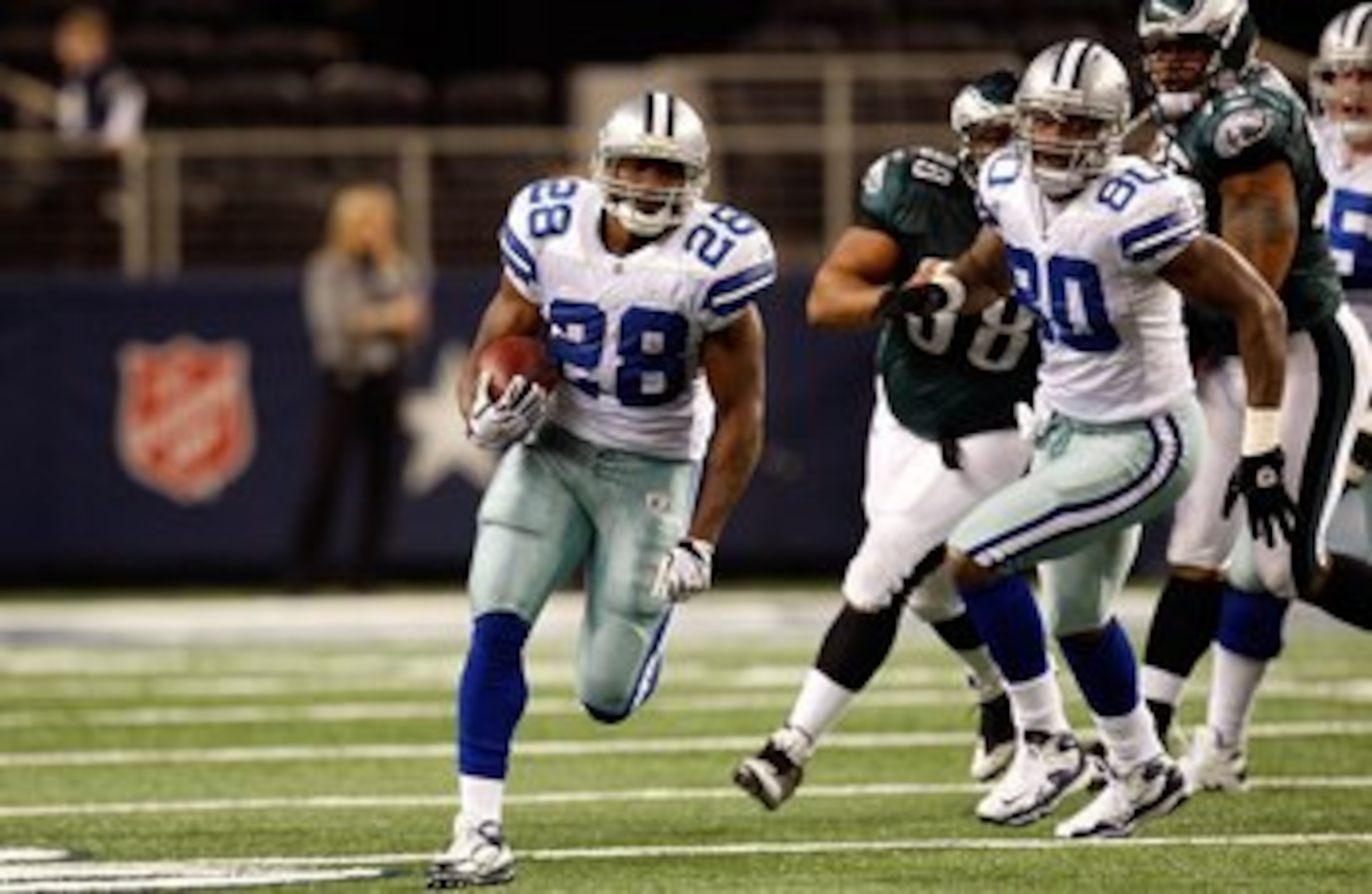 ARLINGTON, TX - JANUARY 09: Running back Felix Jones #28 of the Dallas Cowboys runs the ball against the Philadelphia Eagles during the 2010 NFC wild-card playoff game at Cowboys Stadium on January 9, 2010 in Arlington, Texas. (Photo by Ronald Martinez/ ARLINGTON, TX - JANUARY 09: Running back Felix Jones #28 of the Dallas Cowboys runs the ball against the Philadelphia Eagles during the 2010 NFC wild-card playoff game at Cowboys Stadium on January 9, 2010 in Arlington, Texas. (Photo by Ronald Martinez/
