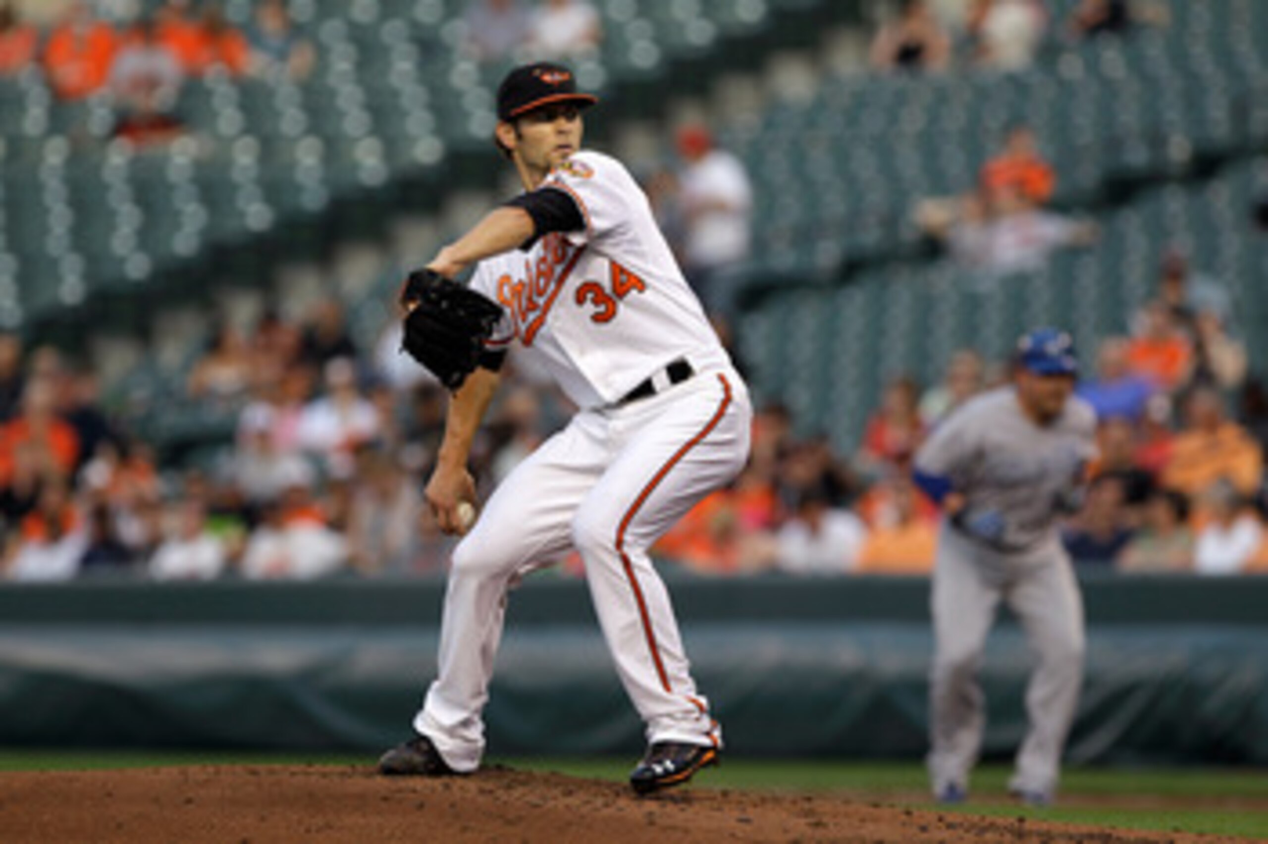 BALTIMORE, MD - MAY 25: Starting pitcher Jake Arrieta #34 of the Baltimore Orioles delivers to a Kansas City Royals batter at Oriole Park at Camden Yards on May 25, 2011 in Baltimore, Maryland. (Photo by Rob Carr/Getty Images) BALTIMORE, MD - MAY 25: Starting pitcher Jake Arrieta #34 of the Baltimore Orioles delivers to a Kansas City Royals batter at Oriole Park at Camden Yards on May 25, 2011 in Baltimore, Maryland. (Photo by Rob Carr/Getty Images)