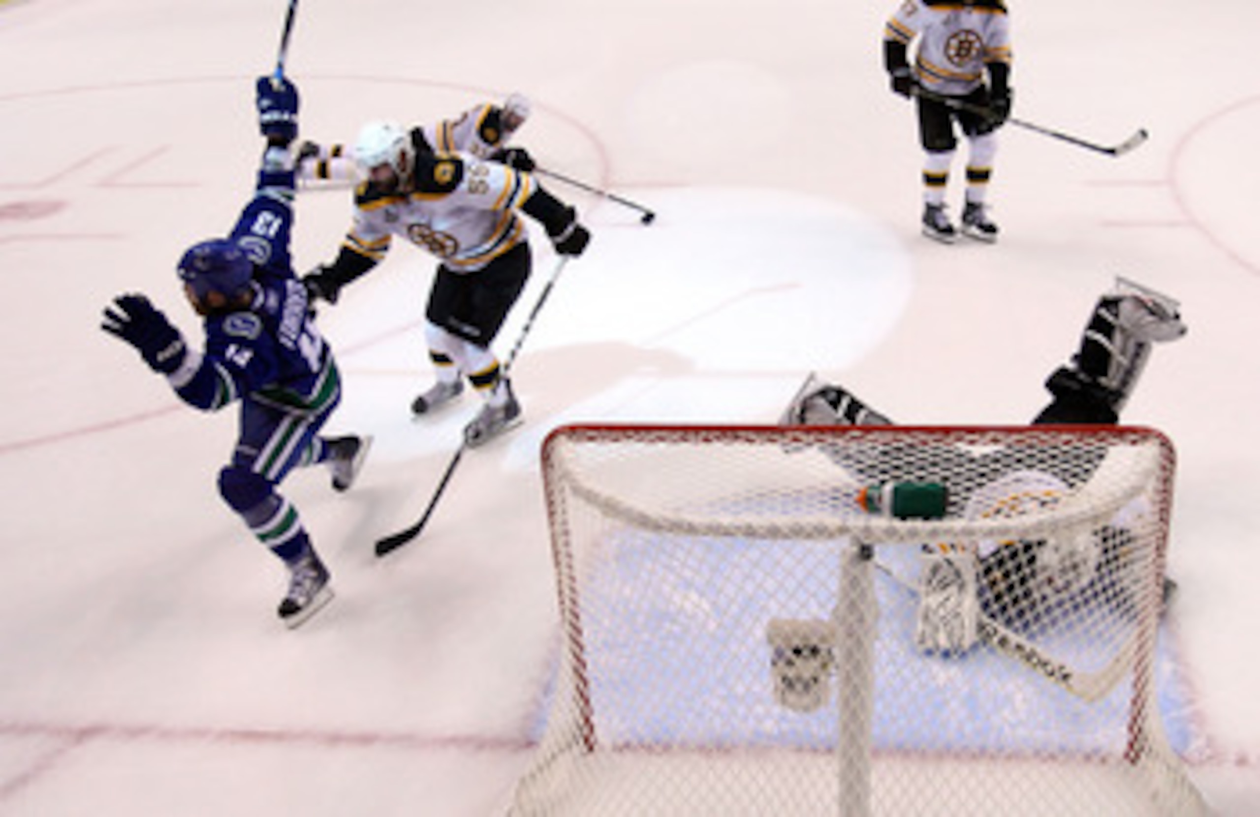 VANCOUVER, BC - JUNE 01:  Raffi Torres #13 of the Vancouver Canucks reacts after scoring a goal late in the third period against Tim Thomas #30 of the Boston Bruins during game one of the 2011 NHL Stanley Cup Finals at Rogers Arena on June 1, 2011 in Vanc
