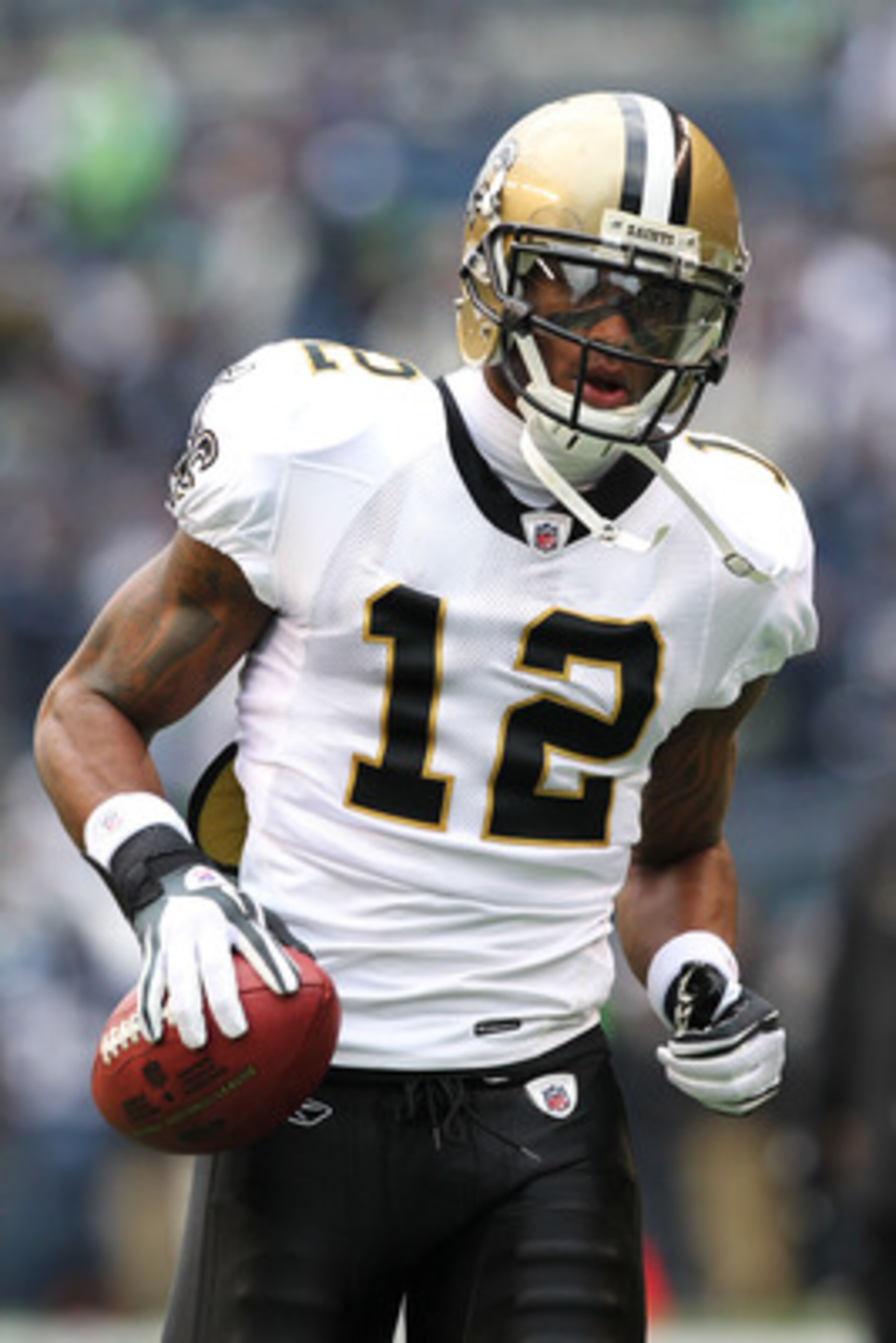 SEATTLE, WA - JANUARY 08: Marques Colston #12 of the New Orleans Saints reacts against the Seattle Seahawks during the 2011 NFC wild-card playoff game at Qwest Field on January 8, 2011 in Seattle, Washington. (Photo by Otto Greule Jr/Getty Images) SEATTLE, WA - JANUARY 08: Marques Colston #12 of the New Orleans Saints reacts against the Seattle Seahawks during the 2011 NFC wild-card playoff game at Qwest Field on January 8, 2011 in Seattle, Washington. (Photo by Otto Greule Jr/Getty Images)