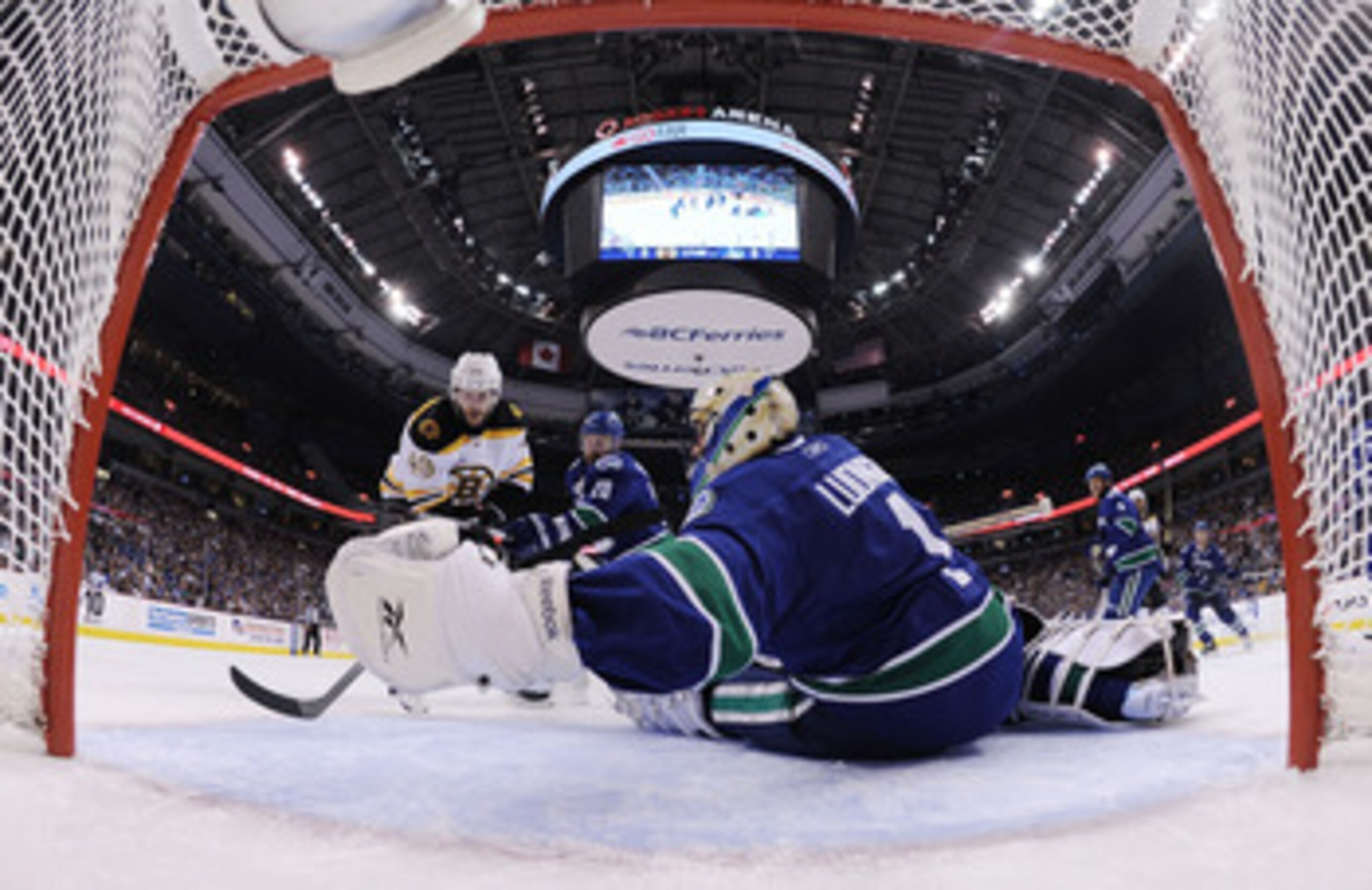 VANCOUVER, BC - JUNE 01:  Roberto Luongo #1 of the Vancouver Canucks makes save against David Krejci #46 of the Boston Bruins during game one of the 2011 NHL Stanley Cup Finals at Rogers Arena on June 1, 2011 in Vancouver, Canada.  (Photo by Bruce Bennett