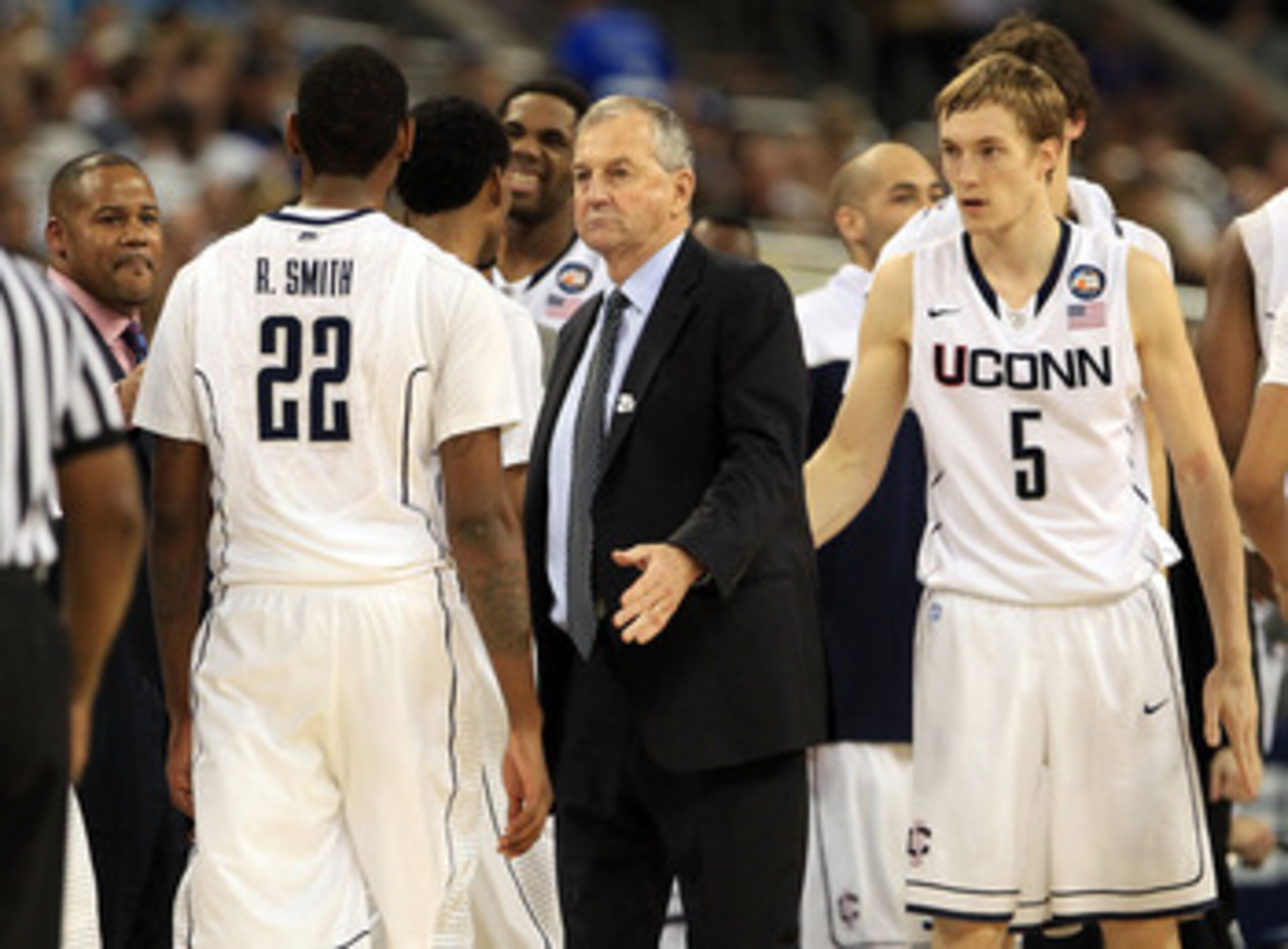HOUSTON, TX - APRIL 02: Head coach Jim Calhoun of the Connecticut Huskies talks to his team against the Kentucky Wildcats during the National Semifinal game of the 2011 NCAA Division I Men's Basketball Championship at Reliant Stadium on April 2, 2011 in HOUSTON, TX - APRIL 02: Head coach Jim Calhoun of the Connecticut Huskies talks to his team against the Kentucky Wildcats during the National Semifinal game of the 2011 NCAA Division I Men's Basketball Championship at Reliant Stadium on April 2, 2011 in