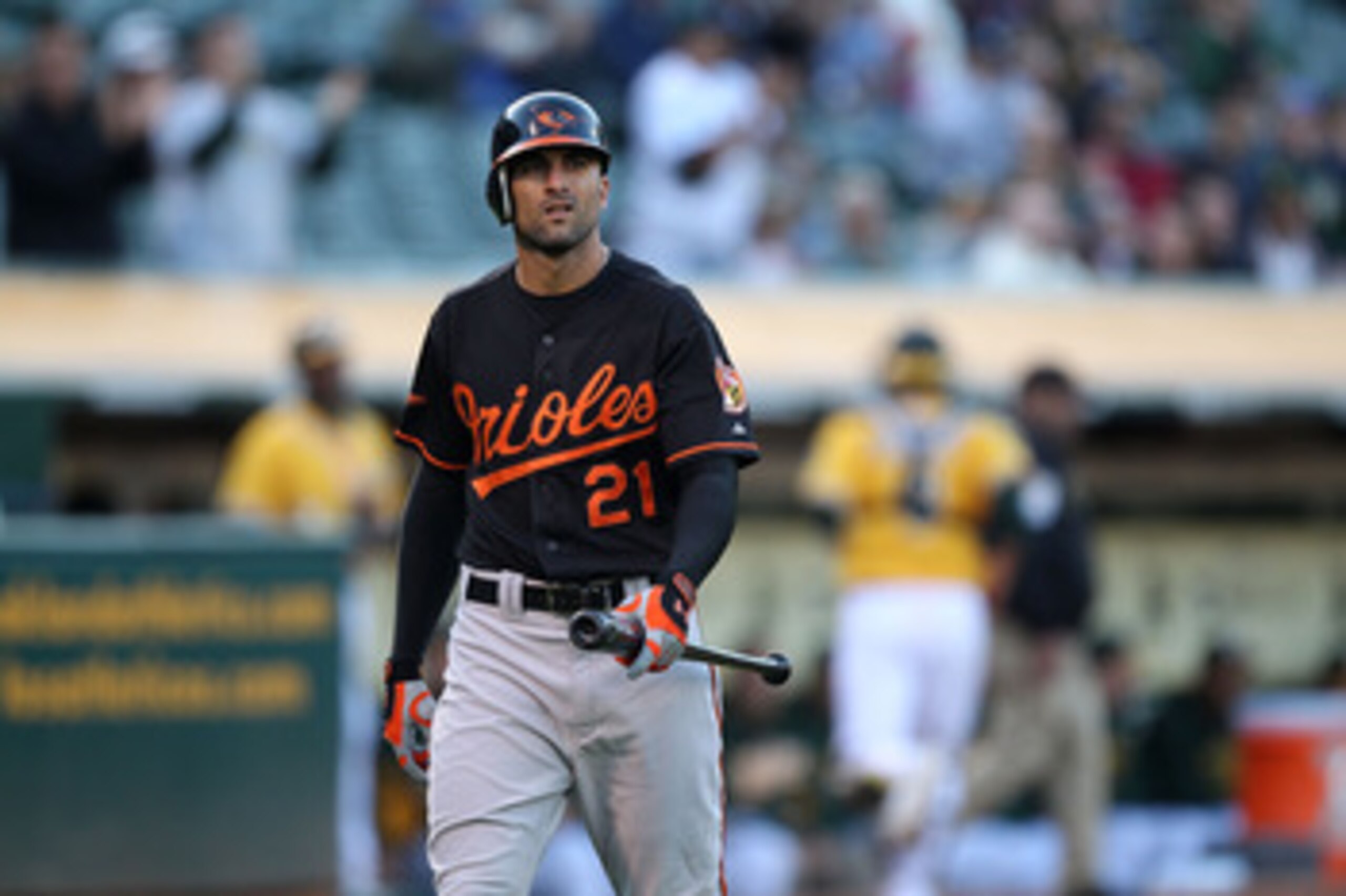 OAKLAND, CA - MAY 27: Nick Markakis #21 of the Baltimore Orioles reacts after striking out in the first inning against the Oakland Athletics during a Major League Baseball game at the Oakland-Alameda County Coliseum on May 27, 2011 in Oakland, California OAKLAND, CA - MAY 27: Nick Markakis #21 of the Baltimore Orioles reacts after striking out in the first inning against the Oakland Athletics during a Major League Baseball game at the Oakland-Alameda County Coliseum on May 27, 2011 in Oakland, California