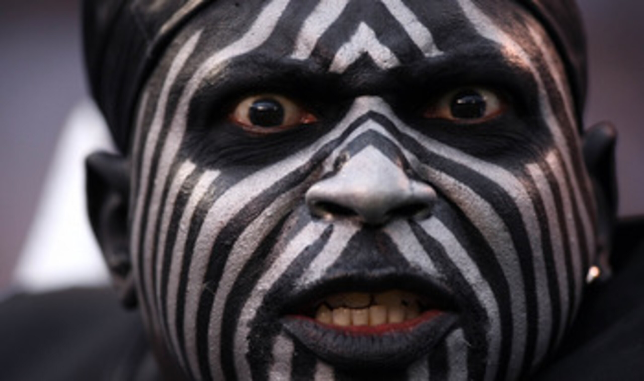 SAN DIEGO, CA - DECEMBER 5: A fan of the Oakland Raiders looks on during their NFL game at Qualcomm Stadium on December 5, 2010 in San Diego, California. (Photo by Donald Miralle/Getty Images)