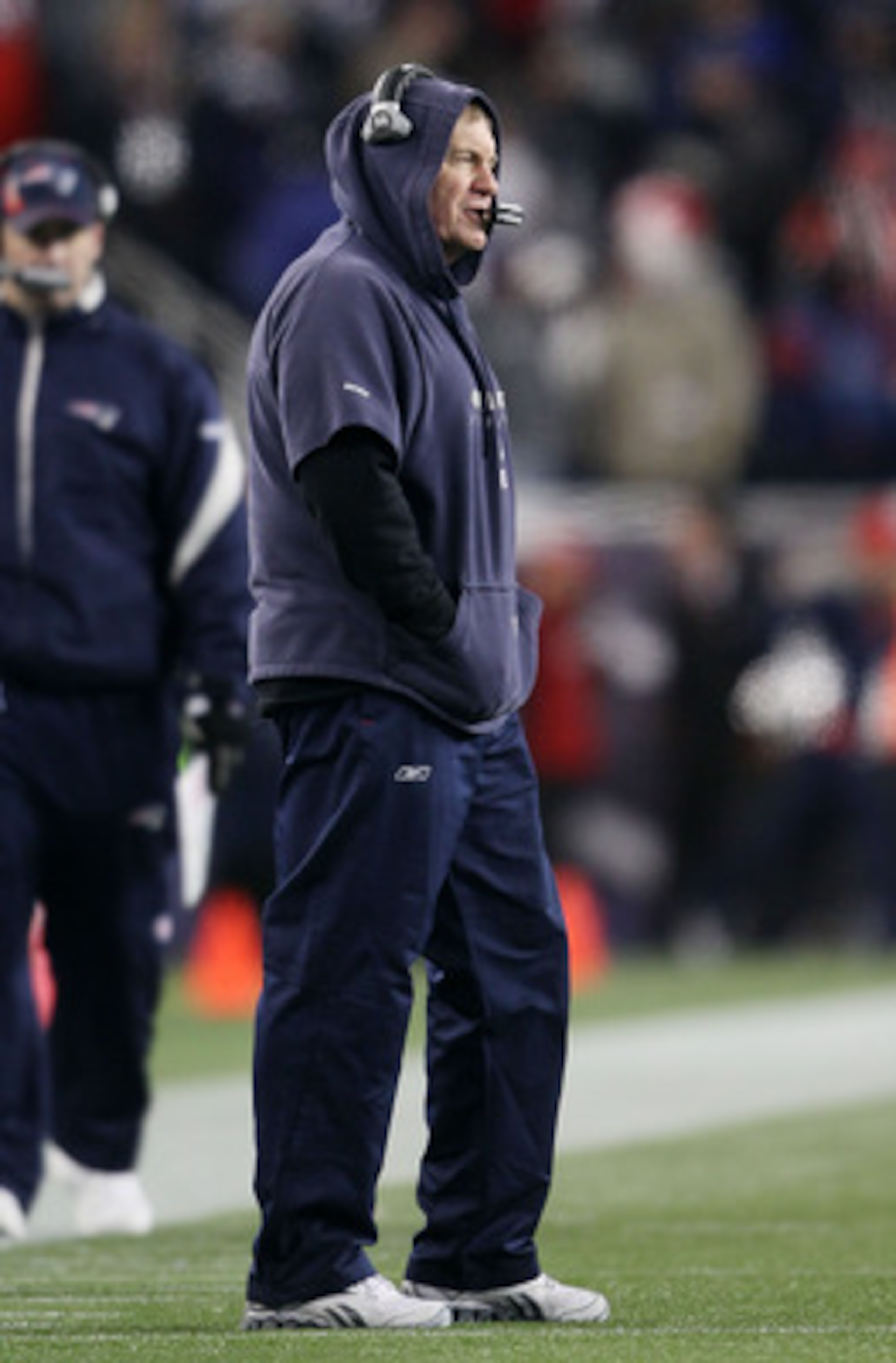 FOXBORO, MA - JANUARY 16: Head coach Bill Belichick of the New England Patriots stands on the field during their 2011 AFC divisional playoff game against the New York Jets at Gillette Stadium on January 16, 2011 in Foxboro, Massachusetts. (Photo by Elsa FOXBORO, MA - JANUARY 16: Head coach Bill Belichick of the New England Patriots stands on the field during their 2011 AFC divisional playoff game against the New York Jets at Gillette Stadium on January 16, 2011 in Foxboro, Massachusetts. (Photo by Elsa