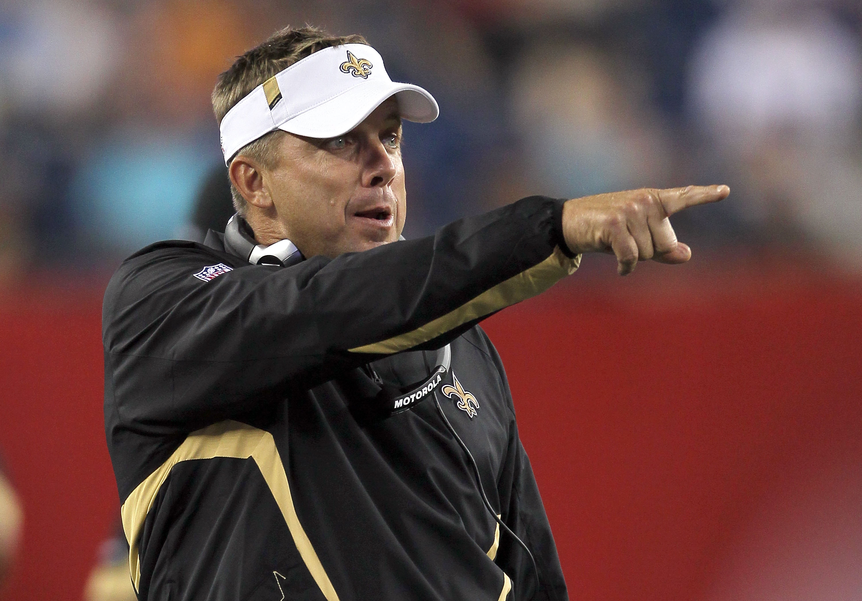FOXBORO, MA - AUGUST 12: Coach Sean Payton of the New Orleans Saints yells to his team during the preseason game against the New England Patriots at Gillette Stadium on August 12, 2010 in Foxboro, Massachusetts. (Photo by Jim Rogash/Getty Images)