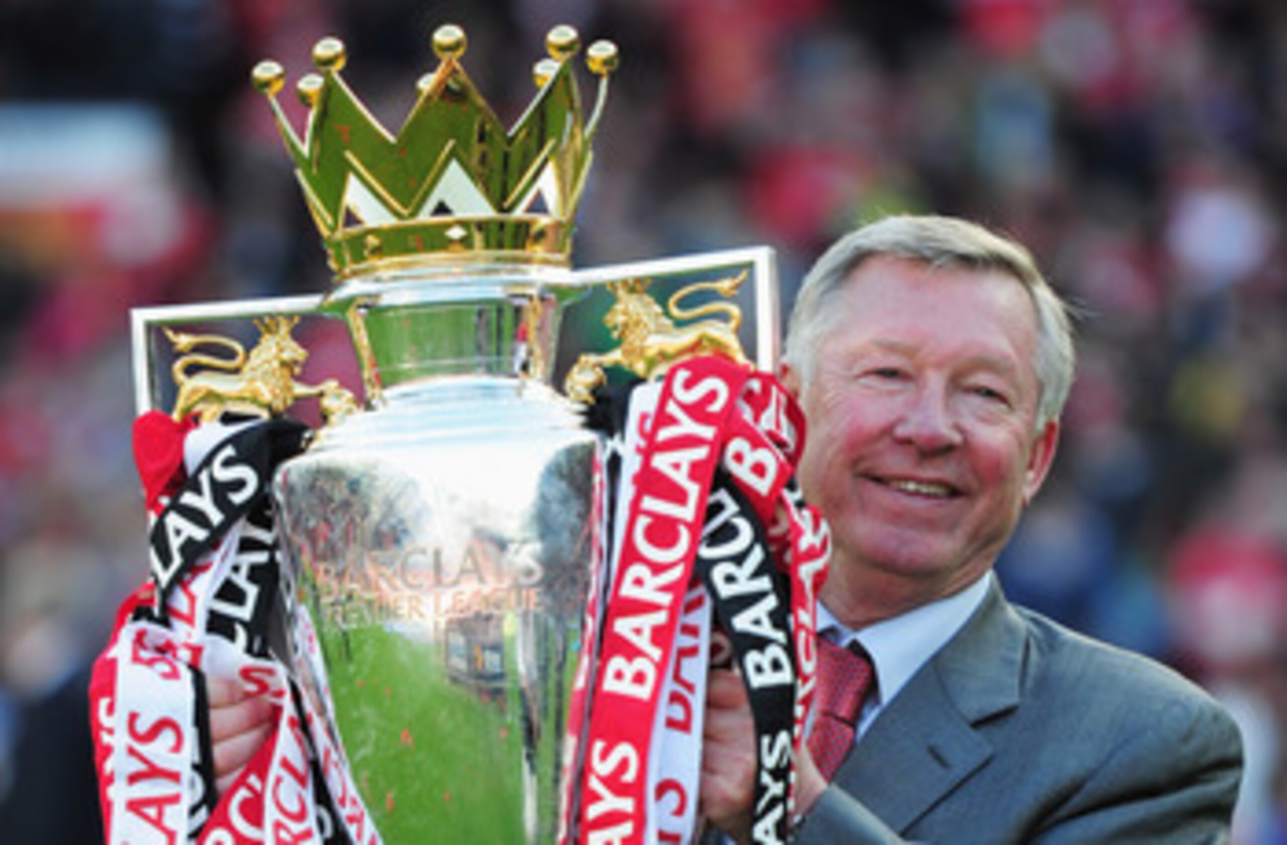 MANCHESTER, ENGLAND - MAY 22:  Sir Alex Ferguson manager of Manchester United lifts the Premier League trophy after the Barclays Premier League match between Manchester United and Blackpool at Old Trafford on May 22, 2011 in Manchester, England. Mancheste