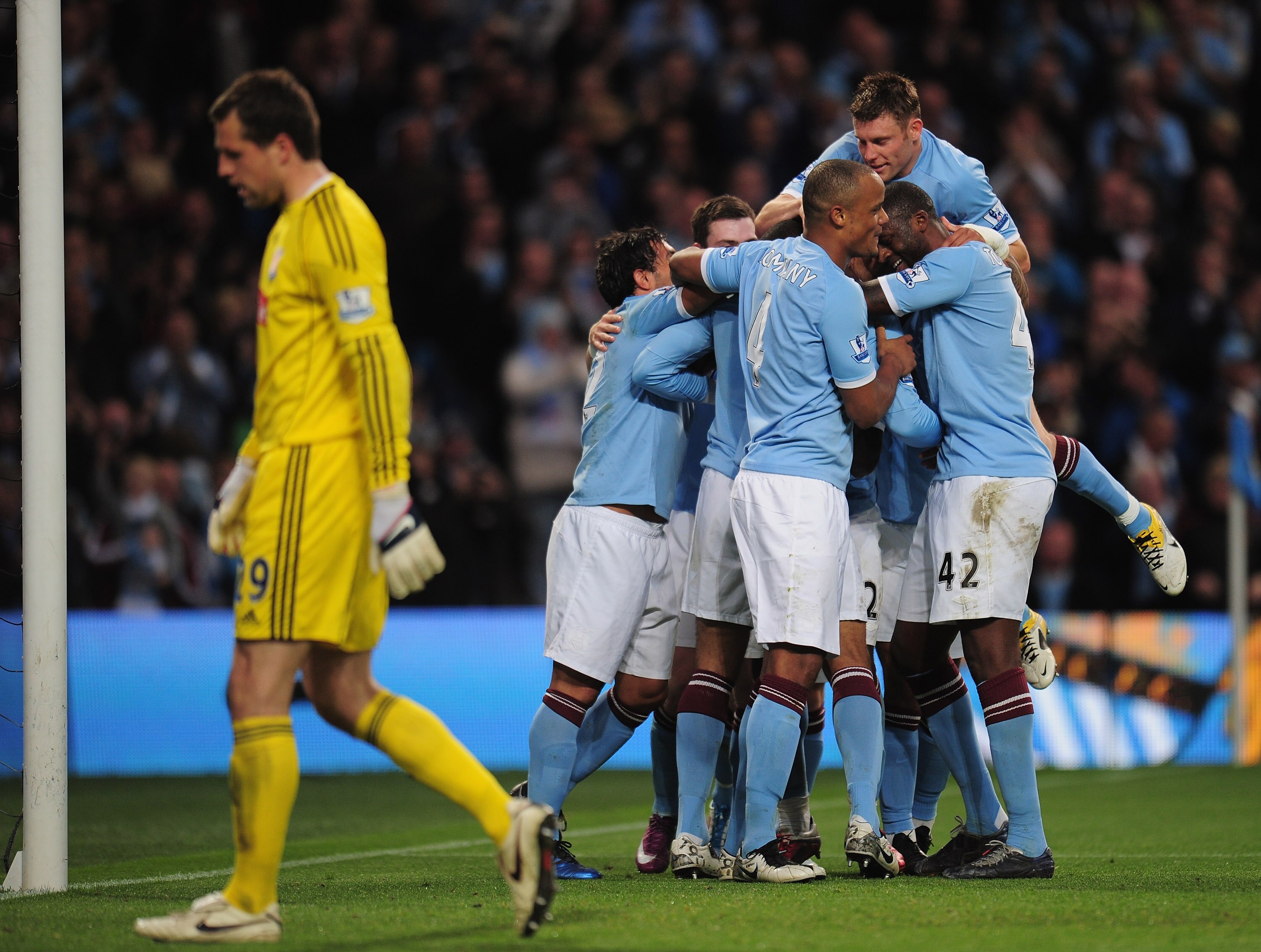 MANCHESTER, ENGLAND - MAY 17:  Joleon Lescott of Manchester City is congratulated by team-mates  after scoring during the Barclays Premier League match between Manchester City and Stoke City at City of Manchester Stadium on May 17, 2011 in Manchester, Eng