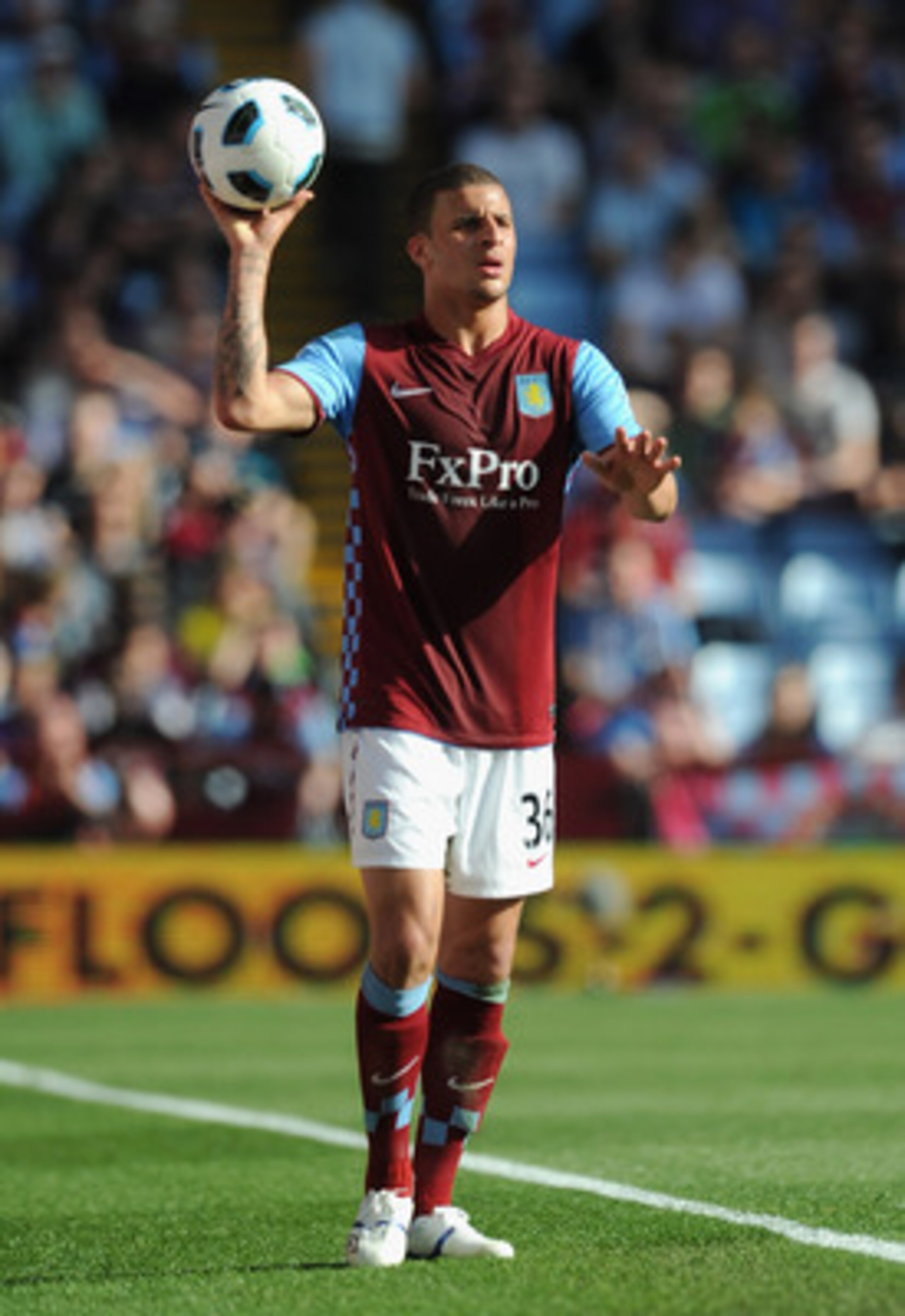 BIRMINGHAM, ENGLAND - APRIL 10:  Kyle Walker of Aston Villa takes a throw in ball during the Barclays Premier League match between Aston Villa and Newcastle United at Villa Park on April 10, 2011 Birmingham, England.  (Photo by Michael Regan/Getty Images)