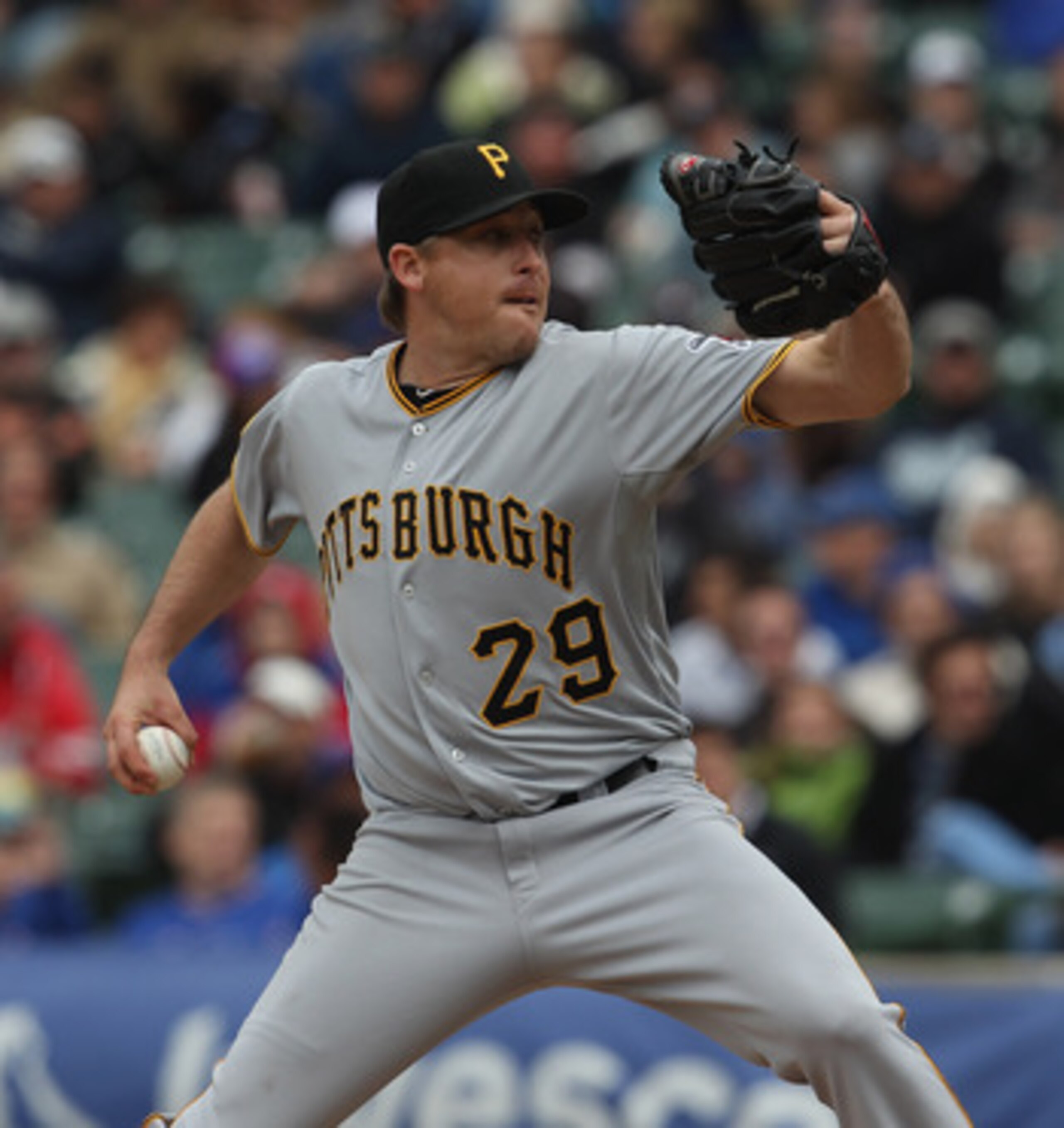 CHICAGO, IL - MAY 27:  Starting pitcher Kevin Correia #29 of the Pittsburgh Pirates delivers the ball against the Chicago Cubs at Wrigley Field on May 27, 2011 in Chicago, Illinois. The Pirates defeated the Cubs 4-2.  (Photo by Jonathan Daniel/Getty Image