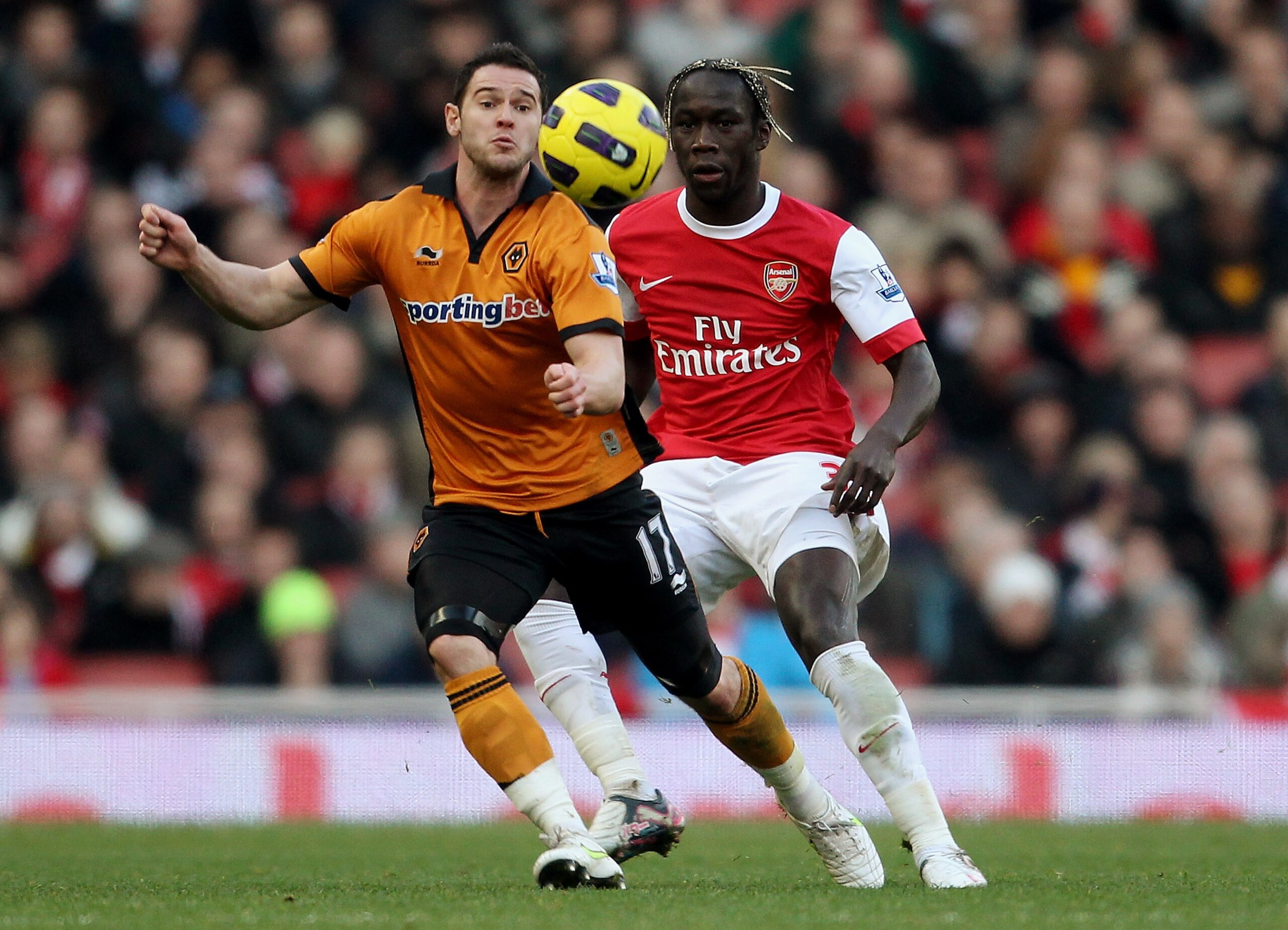 LONDON, ENGLAND - FEBRUARY 12:  Matthew Jarvis of Wolves (L) ina ction with Bacary Sagna during the Barclays Premier League match between Arsenal and Wolverhampton Wanderers on February 12, 2011 in London, England.  (Photo by Scott Heavey/Getty Images)
