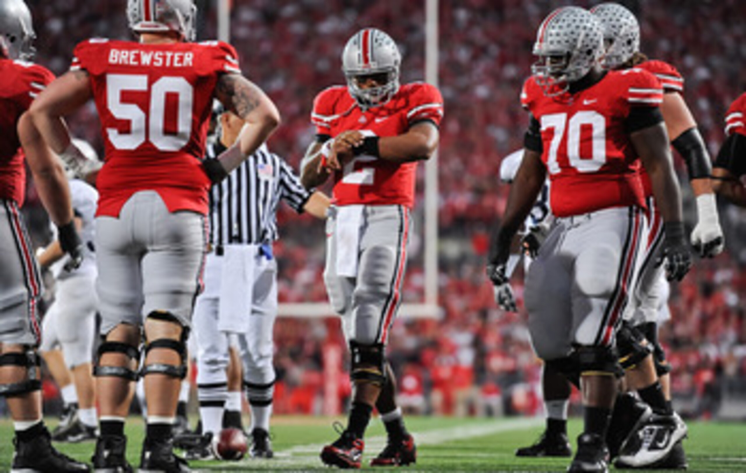 COLUMBUS, OH - NOVEMBER 13:  Quarterback Terrelle Pryor #2 of the Ohio State Buckeyes checks his wristband for the next play against the Penn State Nittany Lions at Ohio Stadium on November 13, 2010 in Columbus, Ohio.  (Photo by Jamie Sabau/Getty Images)