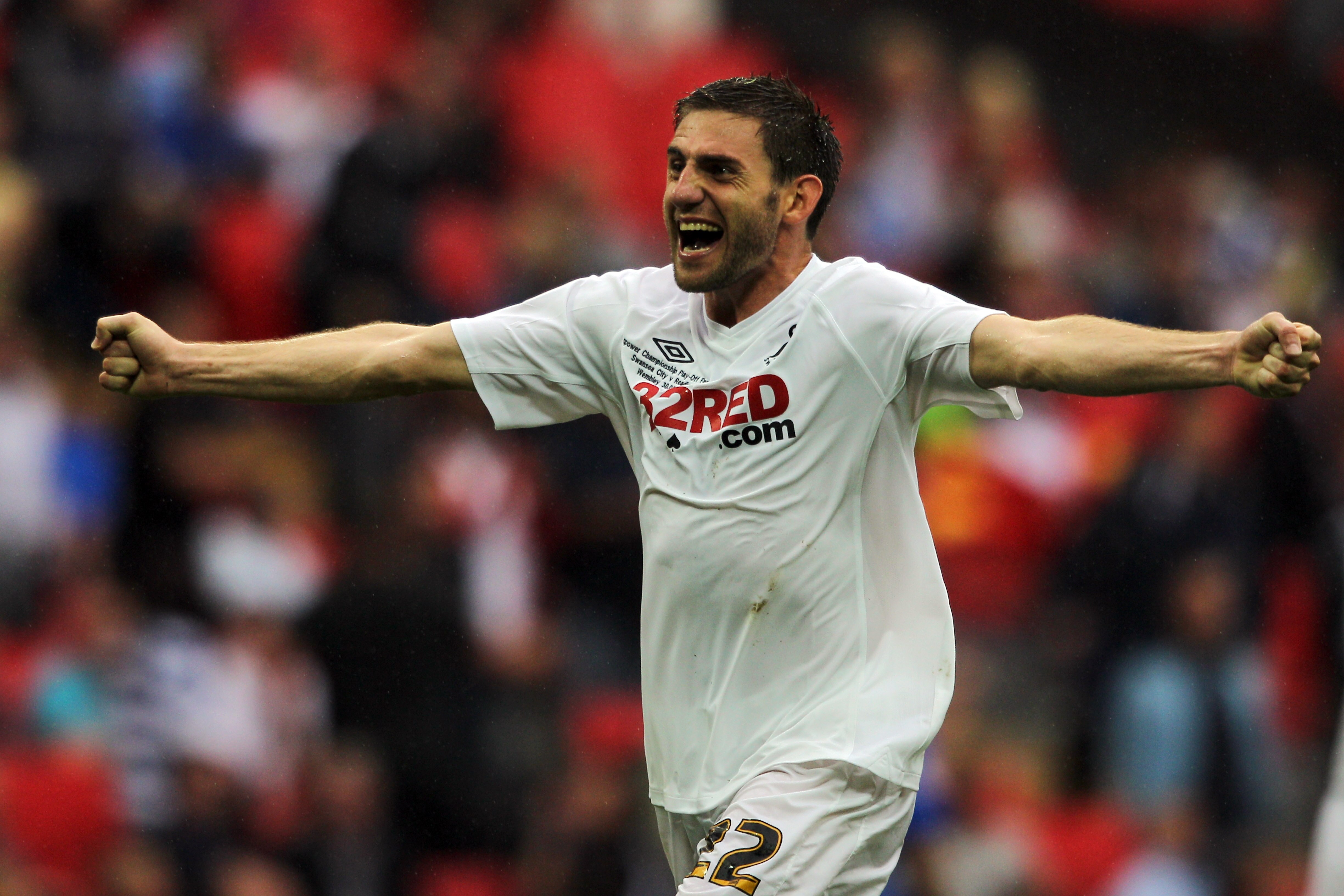 LONDON, ENGLAND - MAY 30:  Angel Rangel of Swansea celebrates after winning the npower Championship Playoff Final between Reading and Swansea City at Wembley Stadium on May 30, 2011 in London, England.  (Photo by Dean Mouhtaropoulos/Getty Images)