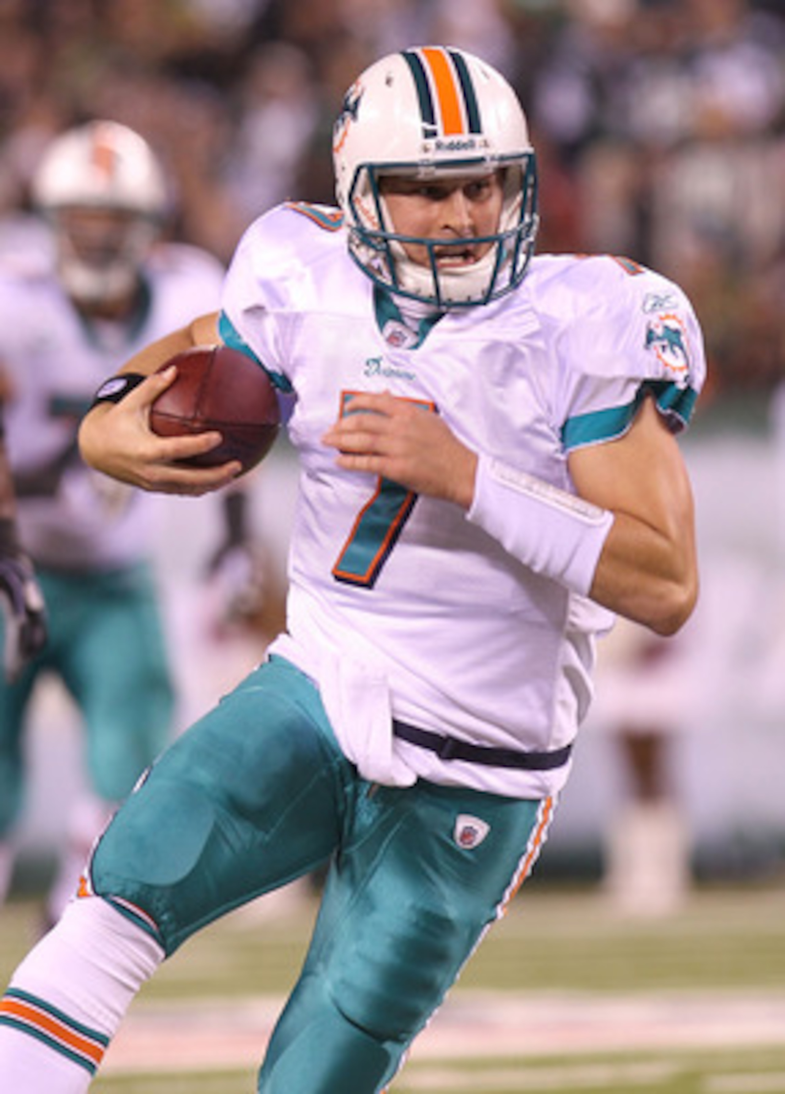 EAST RUTHERFORD, NJ - DECEMBER 12:  Chad Henne #7 of the Miami Dolphins scrambles from the pocket against the New York Jets at New Meadowlands Stadium on December 12, 2010 in East Rutherford, New Jersey.  (Photo by Nick Laham/Getty Images)
