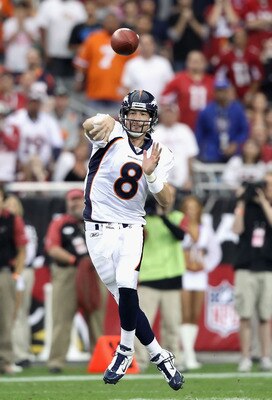 GLENDALE, AZ - DECEMBER 12:  Quarterback Kyle Orton #8 of the Denver Broncos throws a pass during the NFL game against the Arizona Cardinals at the University of Phoenix Stadium on December 12, 2010 in Glendale, Arizona.  (Photo by Christian Petersen/Gett