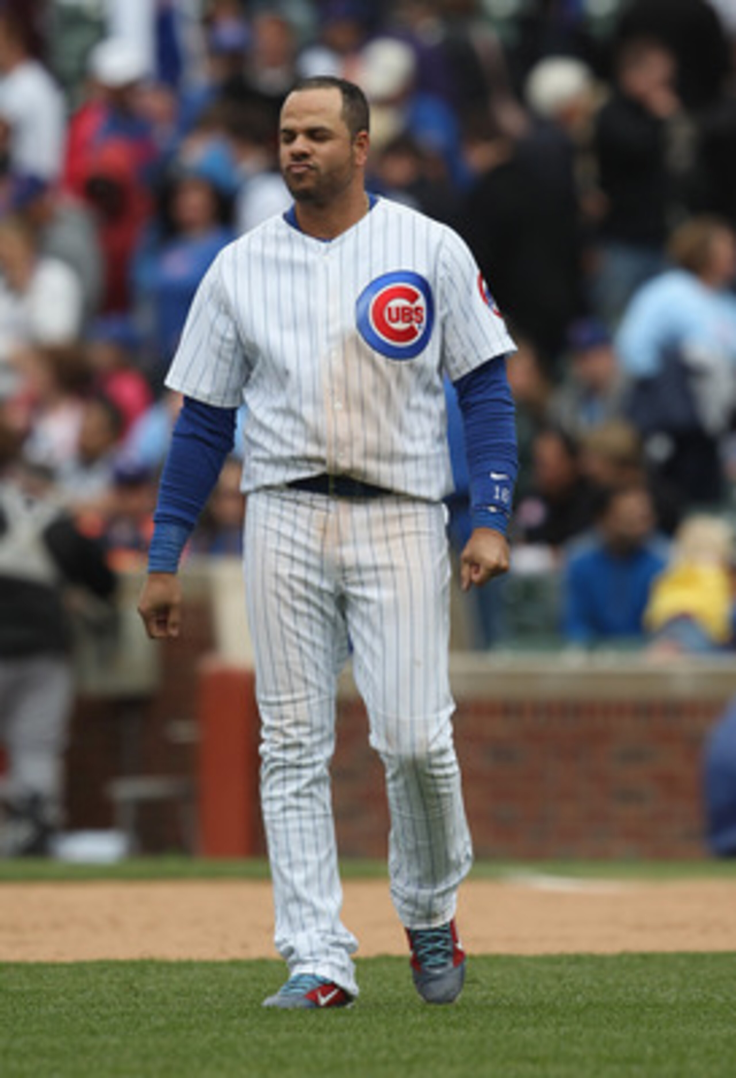 CHICAGO, IL - MAY 27: Aramis Ramirez #16 of the Chicago Cubs walks across the infield after flying out with the bases loaded to end the 8th inning against the Pittsburgh Pirates at Wrigley Field on May 27, 2011 in Chicago, Illinois. The Pirates defeated t