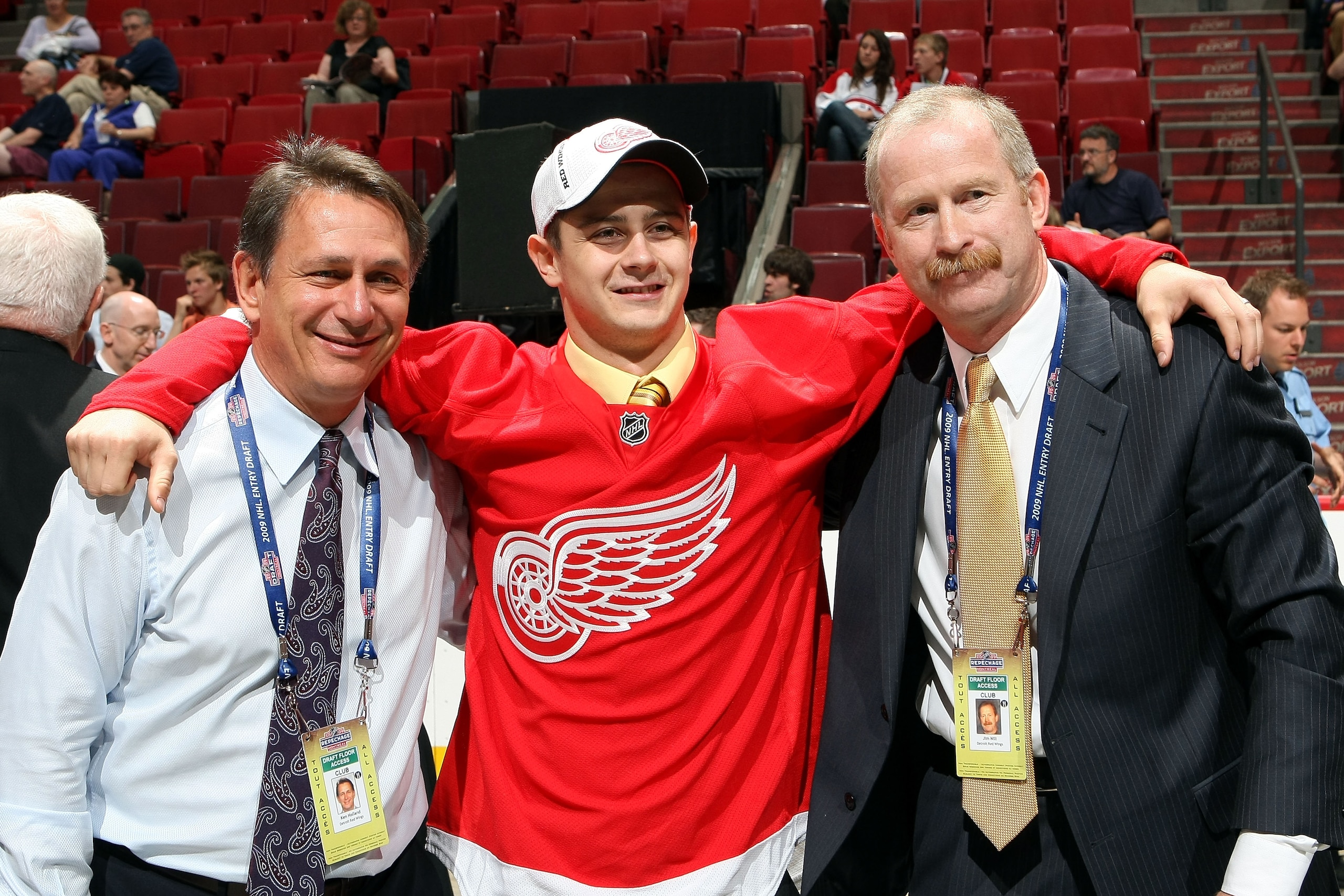 MONTREAL, QC - JUNE 27:  Vice President and Assistant General Manager Jim Nill (R) and Executive Vice President, General Manager and Alternate Governor Ken Holland (L) of the Detroit Red Wings pose for a photo with Tomas Tatar (C) after the Wings drafted