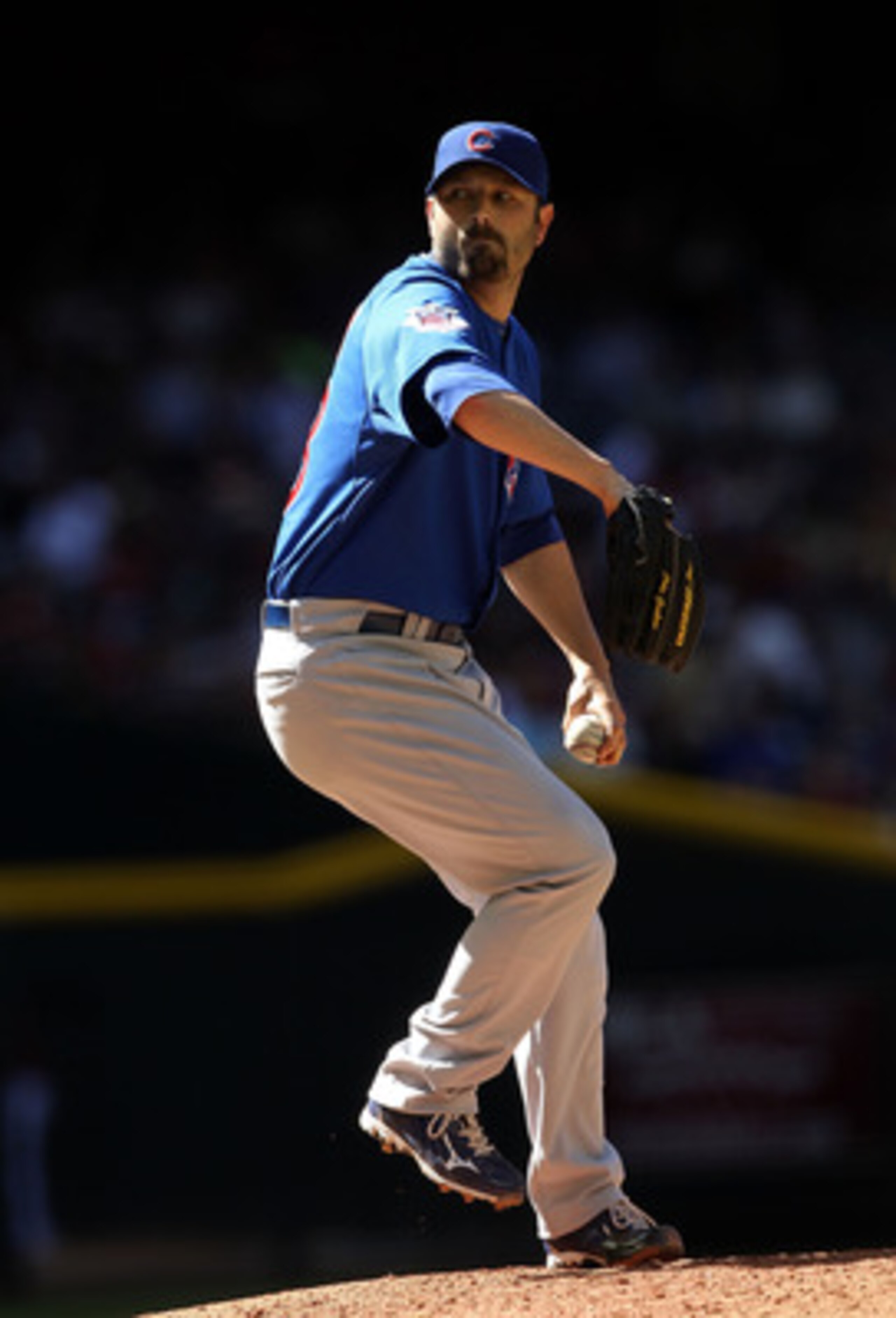 PHOENIX, AZ - MAY 01:  Relief pitcher John Grabow #43 of the Chicago Cubs pitches against the Arizona Diamondbacks during the Major League Baseball game at Chase Field on May 1, 2011 in Phoenix, Arizona.  The Diamondbacks defeated the Cubs 4-3.  (Photo by