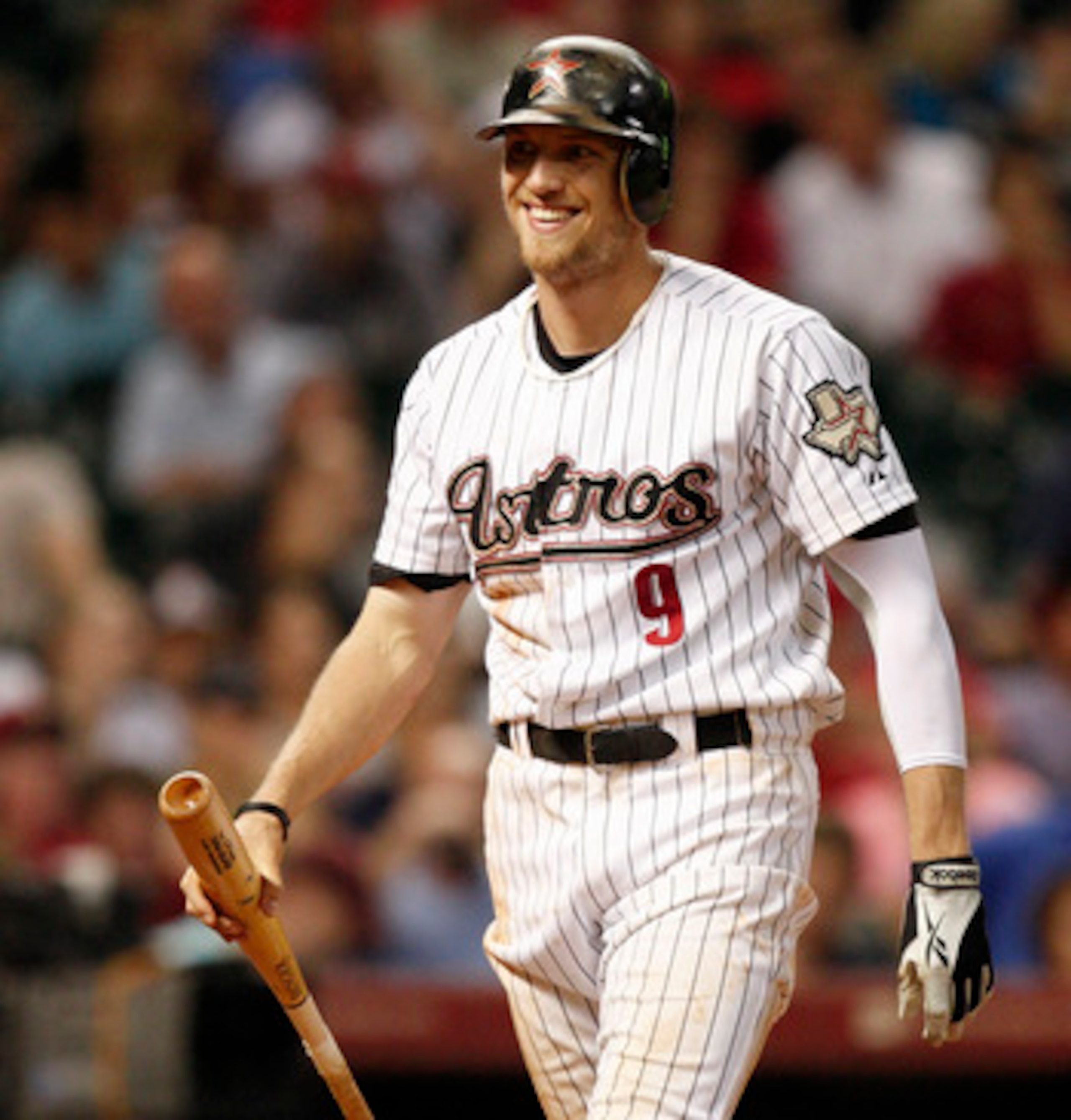 HOUSTON - AUGUST 30:  Hunter Pence #9 of the Houston Astros smiles as he walks back to the dugout after striking out swinging against the St. Louis Cardinals at Minute Maid Park on August 30, 2010 in Houston, Texas. The Astros beat the Cardinals 3-0.  (Ph