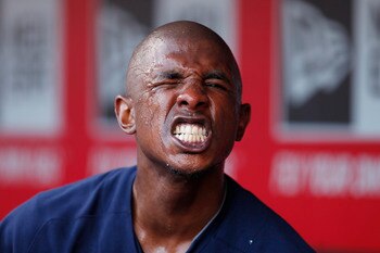 CINCINNATI, OH - JUNE 1: Nyjer Morgan #2 of the Milwaukee Brewers makes a face for the camera after pouring water over his face during the game against the Cincinnati Reds at Great American Ball Park on June 1, 2011 in Cincinnati, Ohio. (Photo by Joe Robb
