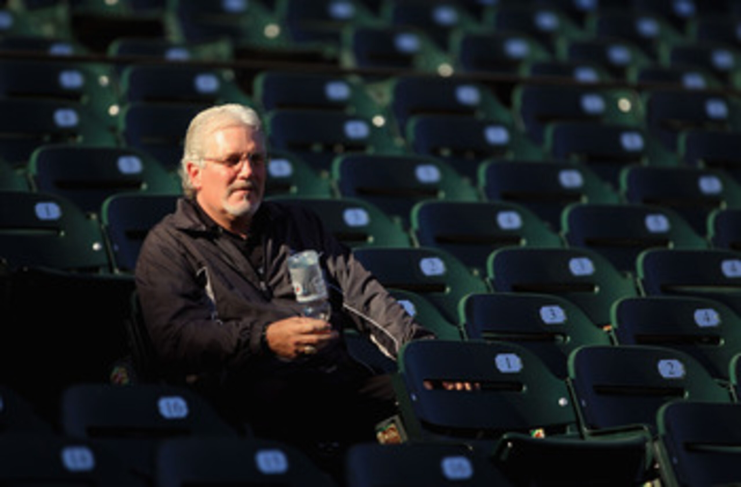 SAN FRANCISCO - OCTOBER 13:  San Francisco Giants general manager Brian Sabean sits in the stands during a workout session in preparation for the National League Championship Series at AT&T Park on October 13, 2010 in San Francisco, California.  (Photo by