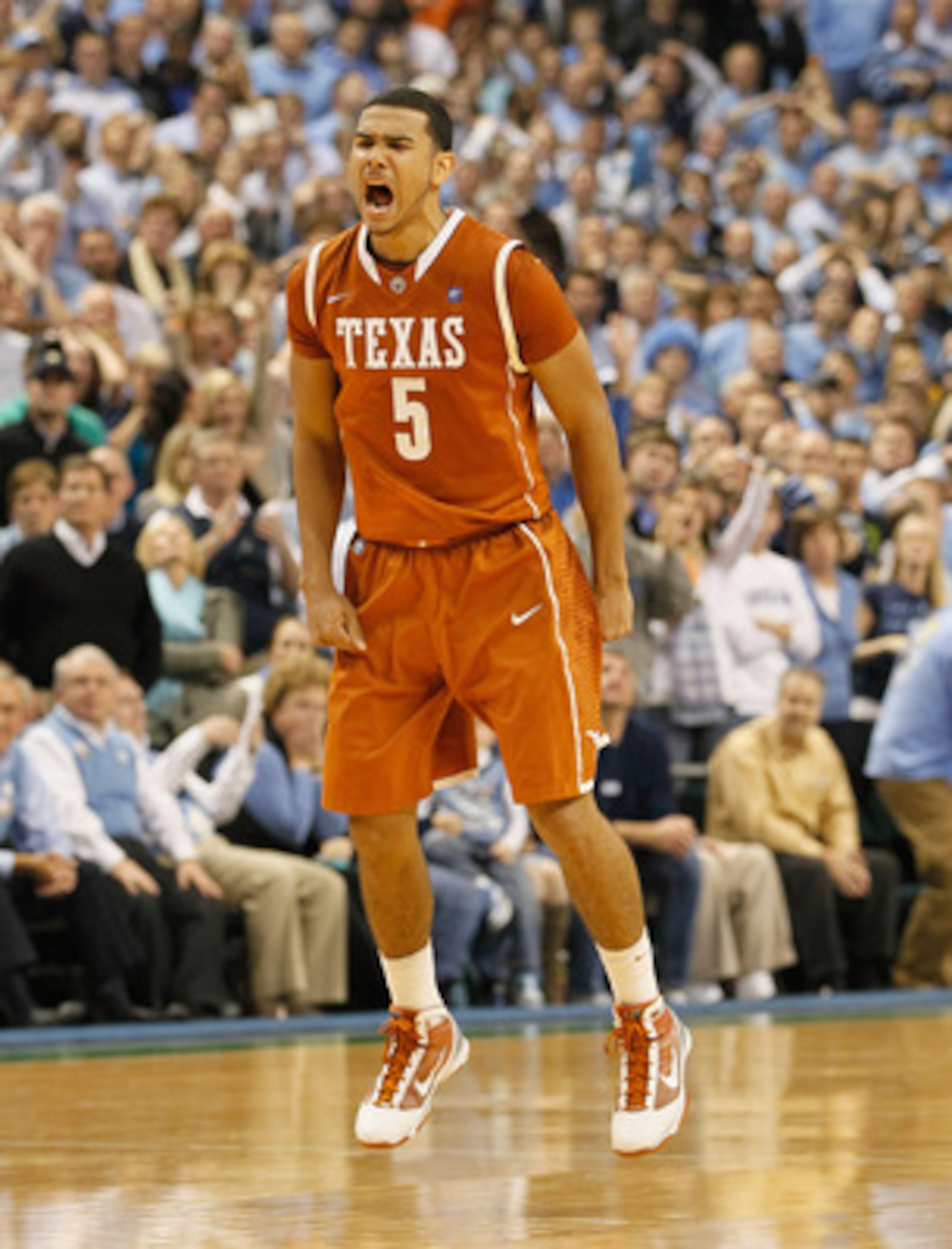 GREENSBORO, NC - DECEMBER 18:  Cory Joseph #5 of the Texas Longhorns reacts after hitting what became the game-winning basket against the North Carolina Tar Heels Greensboro Coliseum on December 18, 2010 in Greensboro, North Carolina.  (Photo by Kevin C.