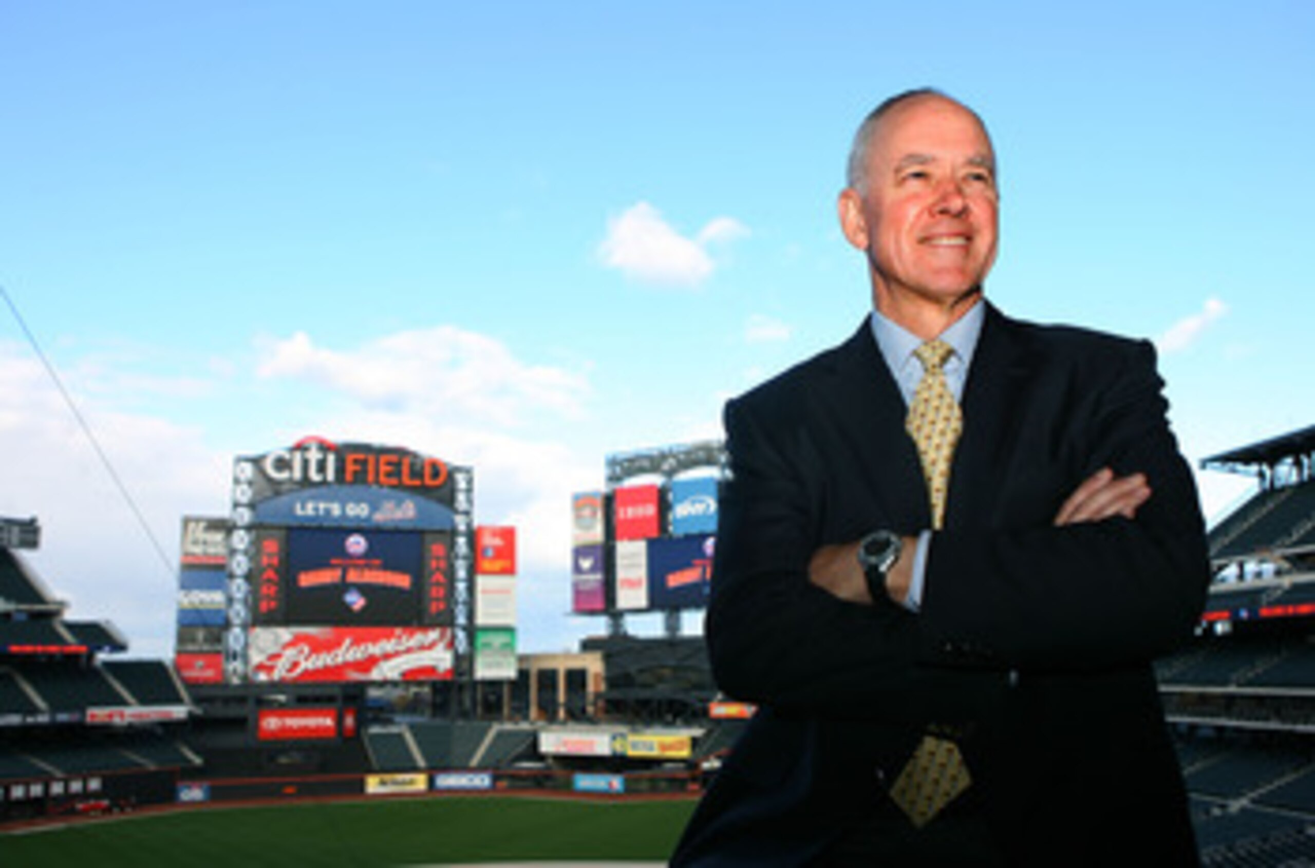NEW YORK - OCTOBER 29:  Sandy Alderson poses for photographers after being introduced as the general manager for the New York Mets on October 29, 2010 at Citi Field in the Flushing neighborhood of the Queens borough of New York City.  (Photo by Andrew Bur