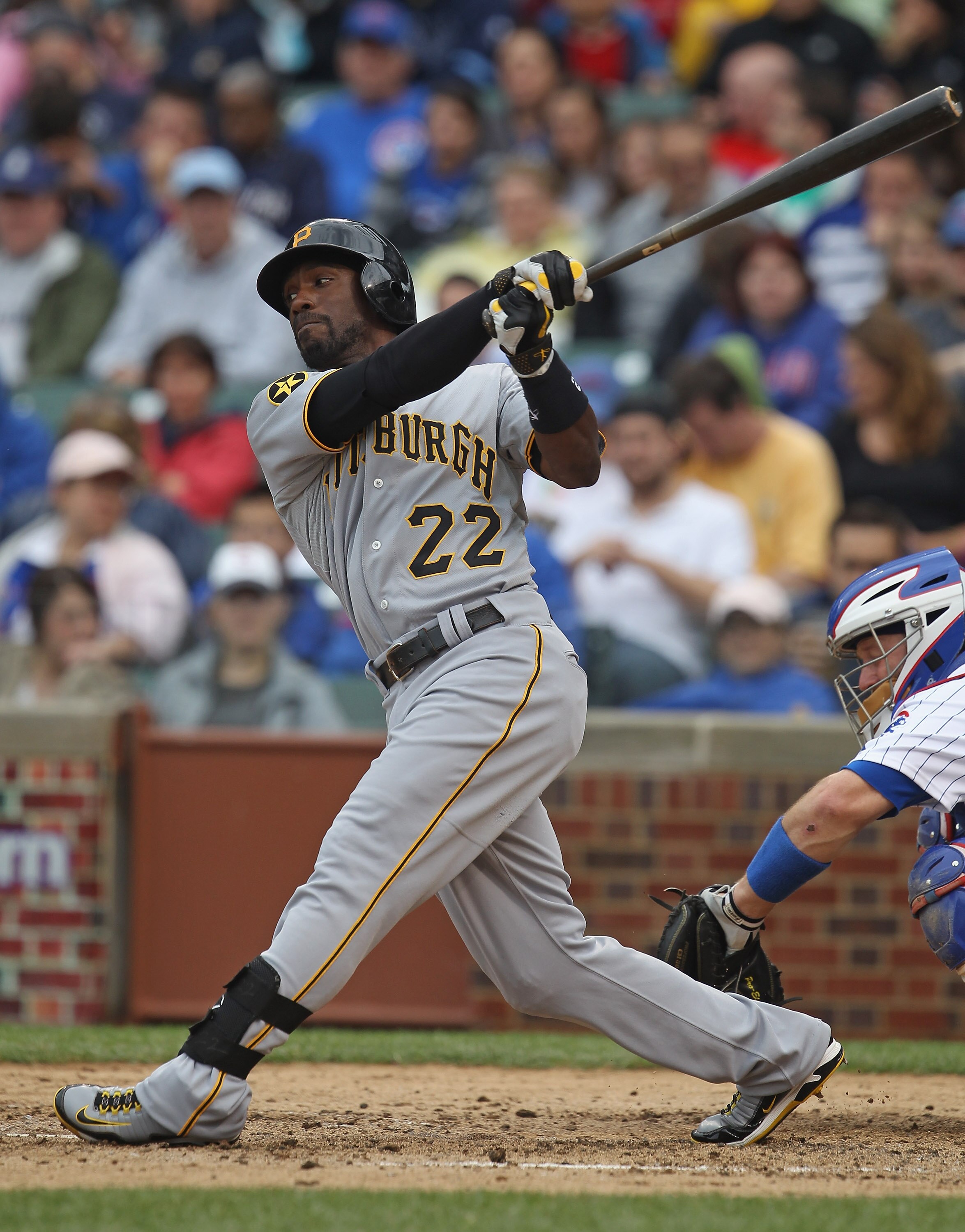CHICAGO, IL - MAY 29:  Andrew McCutchen #22 of the Pittsburgh Pirates hits the ball against the Chicago Cubs at Wrigley Field on May 29, 2011 in Chicago, Illinois. The Cubs defeated the Pirates 3-2.  (Photo by Jonathan Daniel/Getty Images)
