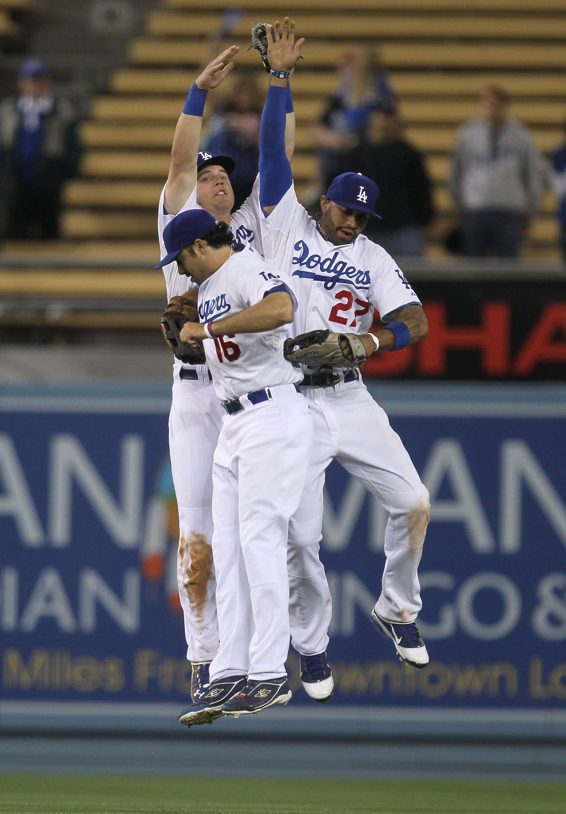 LOS ANGELES, CA - MAY 31:  Outfielders Matt Kemp #27, Andre Ethier #16, and Jerry Sands #47 of the Los Angeles Dodgers celebrate after the game with the Colorado Rockies on May 31, 2011 at Dodger Stadium in Los Angeles, California. The Dodgers won 8-2.  (