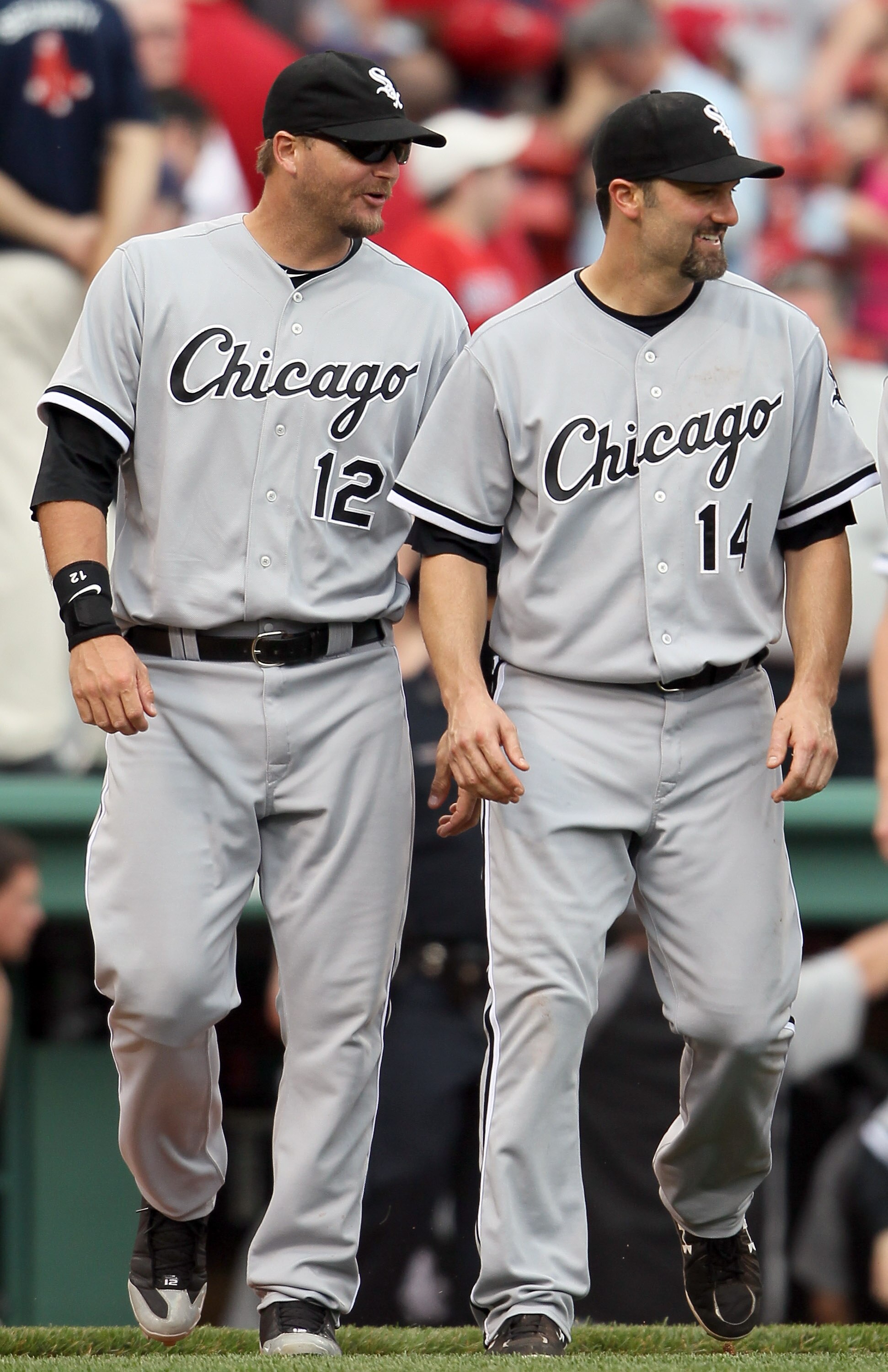 BOSTON, MA - JUNE 01:  A.J. Pierzynski #12 and Paul Konerko #14 of the Chicago White Sox celebrate the win over the Boston Red Sox on June 1, 2011 at Fenway Park in Boston, Massachusetts. The Chicago White Sox defeated the Boston Red Sox 7-4.  (Photo by E