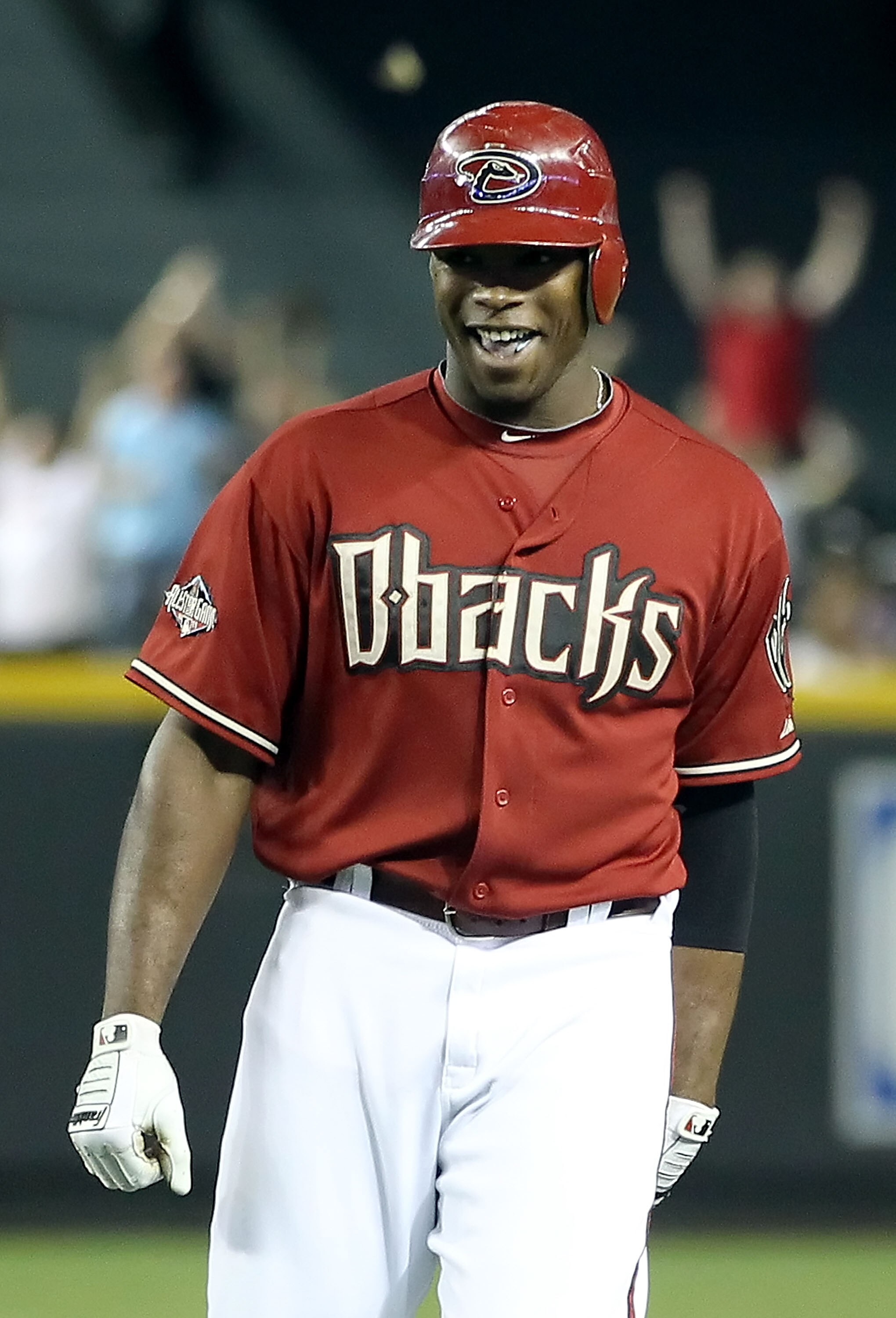PHOENIX, AZ - JUNE 01:  Justin Upton #10 of the Arizona Diamondbacks celebrates after his game winning RBI single against the Florida Marlins in ninth inning of the Major League Baseball game at Chase Field on June 1, 2011 in Phoenix, Arizona. The Diamond