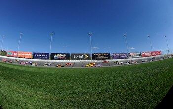 KANSAS CITY, KS - OCTOBER 03:  A view of cars racing during the NASCAR Sprint Cup Series Price Chopper 400 on October 3, 2010 in Kansas City, Kansas.  (Photo by John Harrelson/Getty Images)