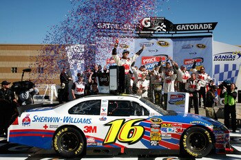 KANSAS CITY, KS - OCTOBER 03:  Greg Biffle, driver of the #16 3M Ford, celebrates in victory lane after winning the NASCAR Sprint Cup Series Price Chopper 400 on October 3, 2010 in Kansas City, Kansas.  (Photo by Jerry Markland/Getty Images for NASCAR)