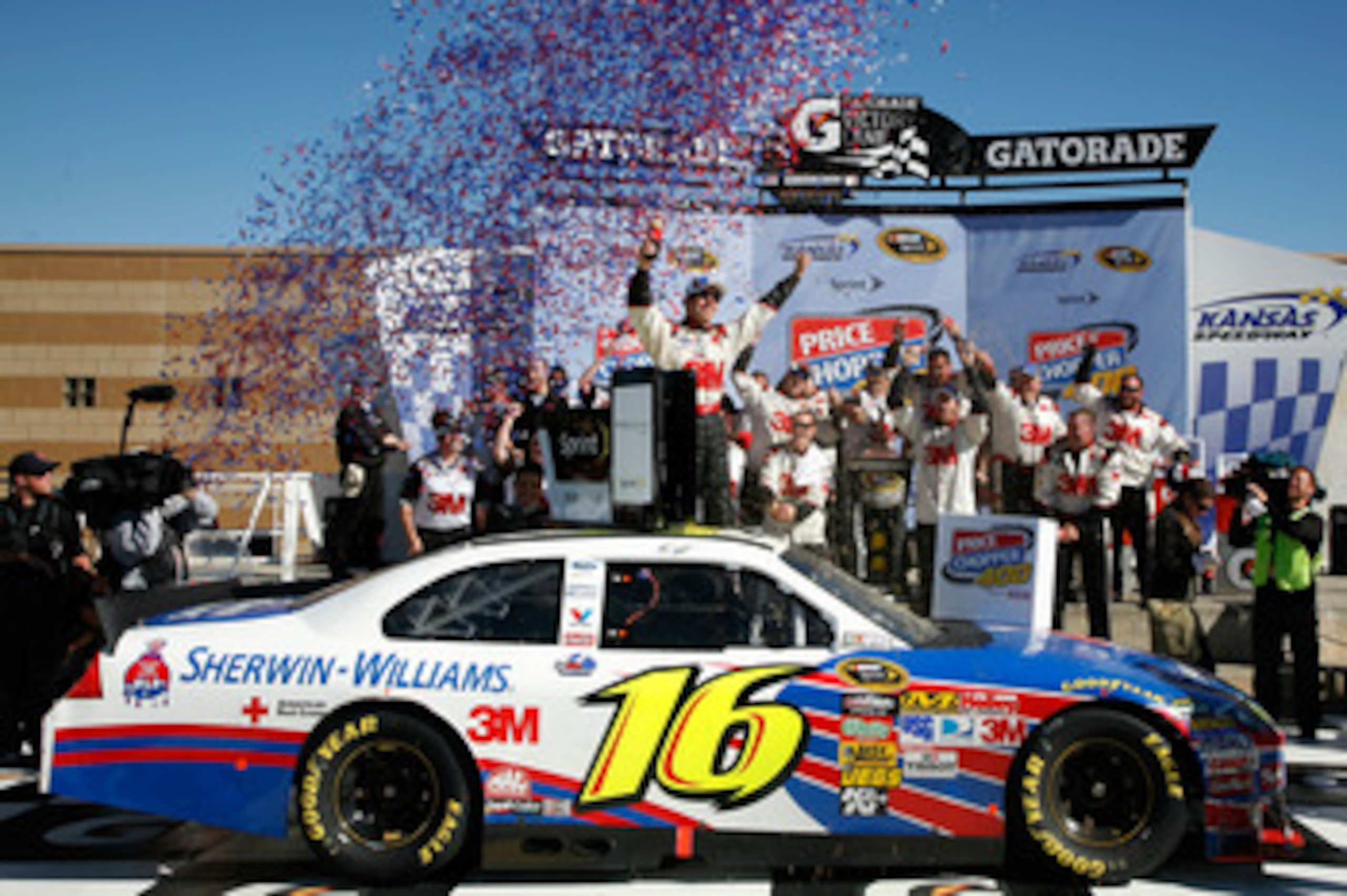 KANSAS CITY, KS - OCTOBER 03:  Greg Biffle, driver of the #16 3M Ford, celebrates in victory lane after winning the NASCAR Sprint Cup Series Price Chopper 400 on October 3, 2010 in Kansas City, Kansas.  (Photo by Jerry Markland/Getty Images for NASCAR)