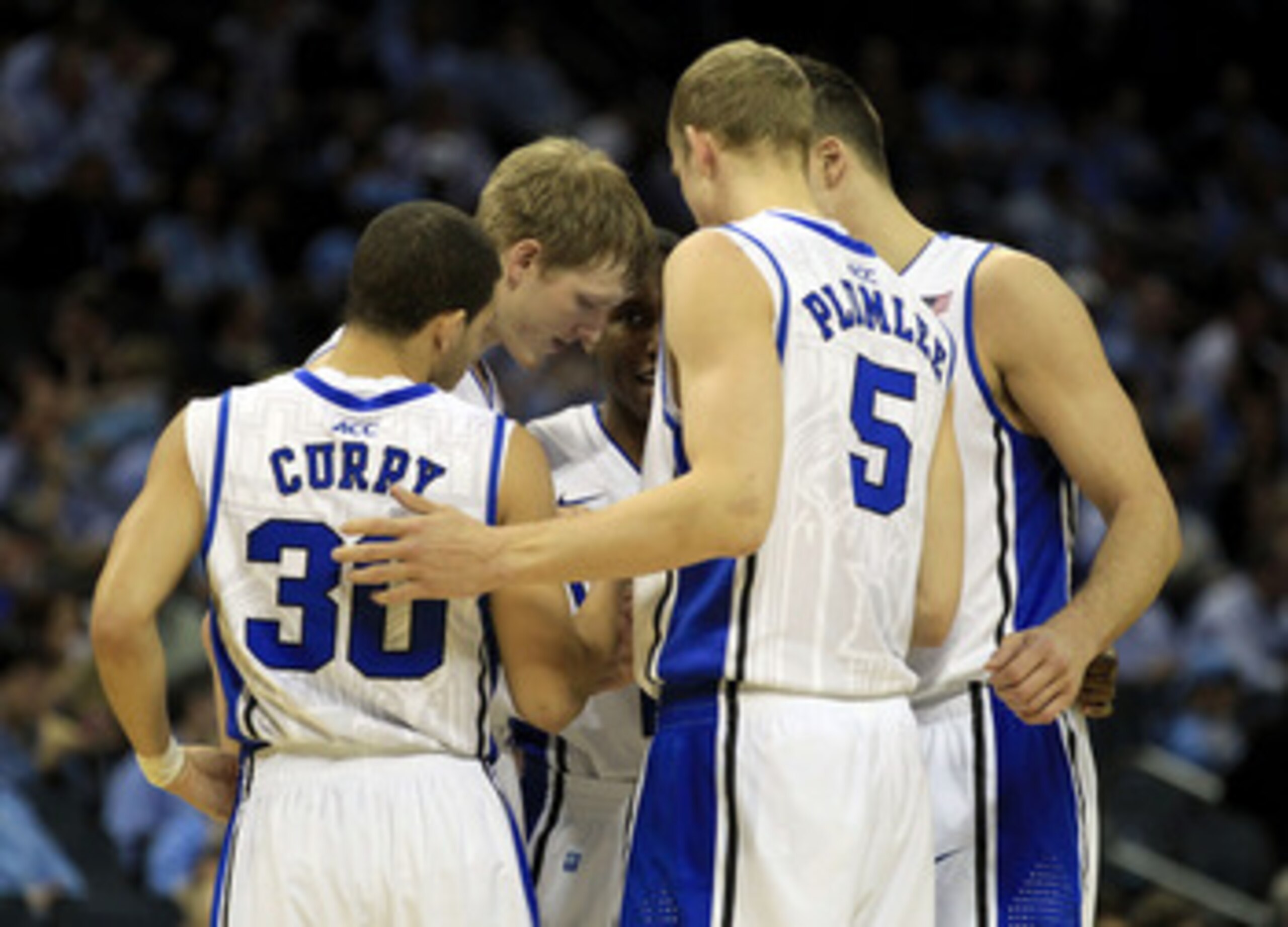 CHARLOTTE, NC - MARCH 20:  The Duke Blue Devils huddle before taking on the Michigan Wolverines during the third round of the 2011 NCAA men's basketball tournament at Time Warner Cable Arena on March 20, 2011 in Charlotte, North Carolina.  (Photo by Stree