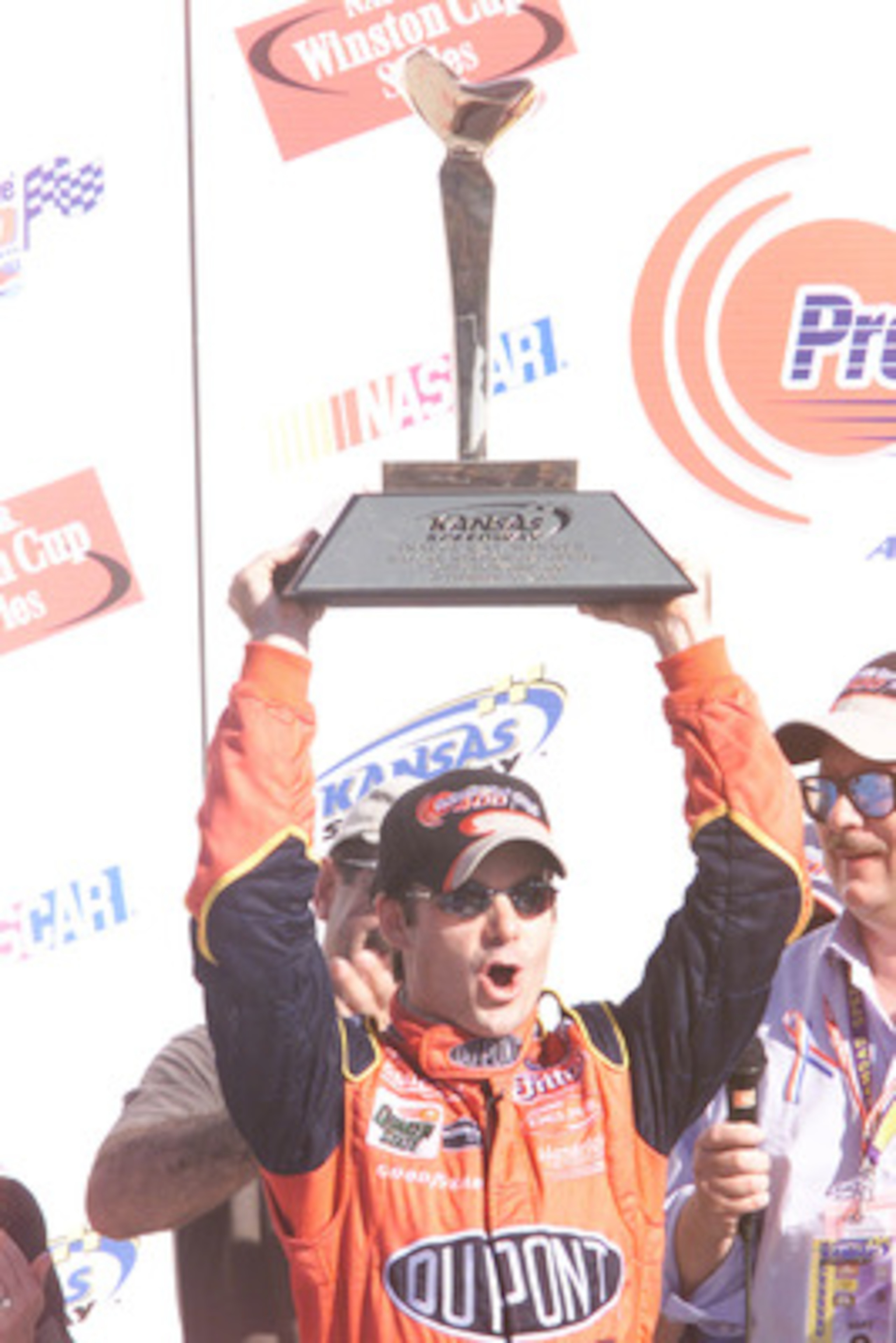 30 Sep 2001:      Jeff Gordon celebrates  winning  the NASCAR Winston Cup Series  Protection One 400 at Kansas Speedway  in Kansas City, Kansas. DIGITAL IMAGE.  Mandatory Credit: Jonathan Ferrey/Allsport