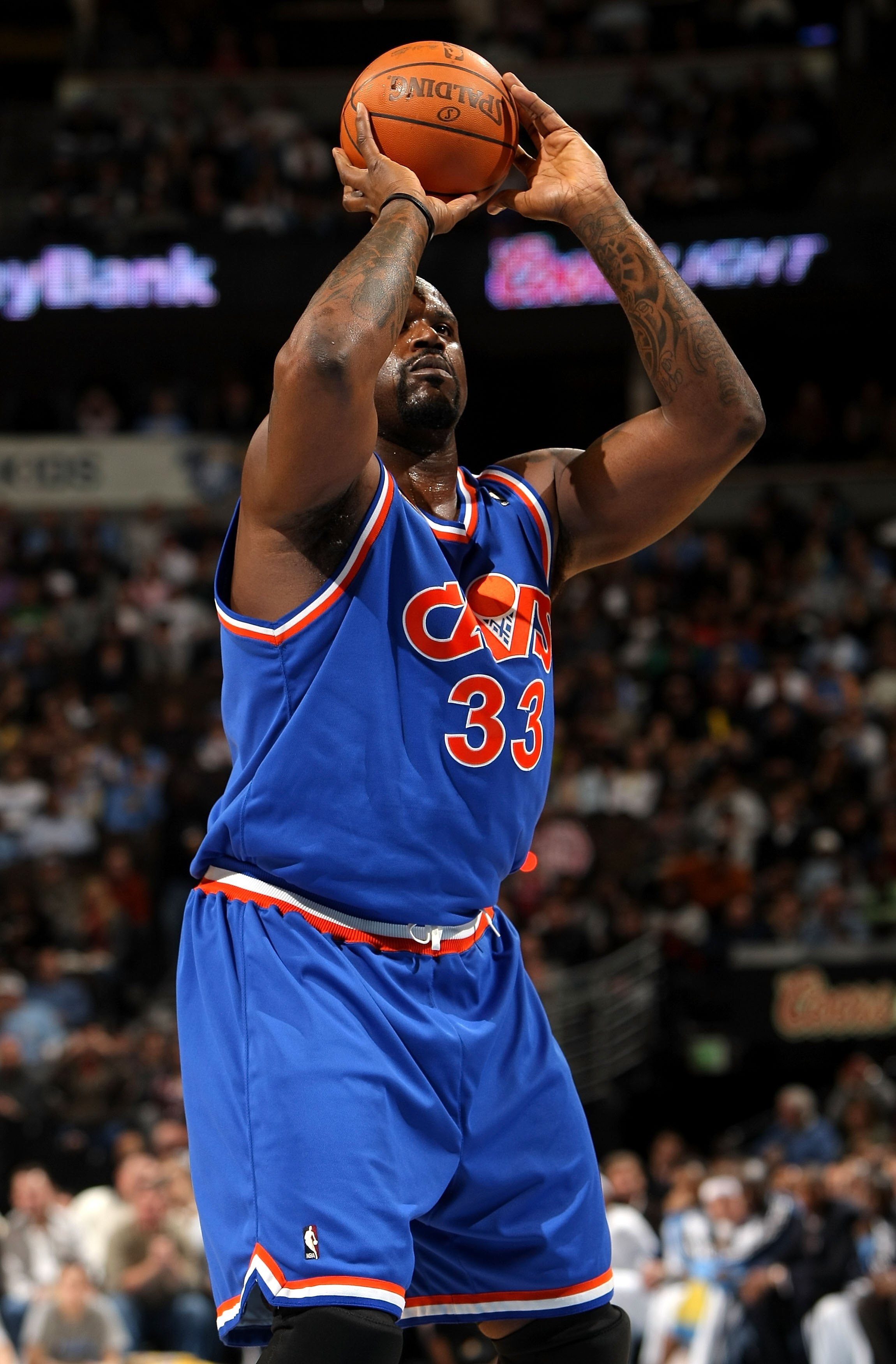 DENVER - JANUARY 08:  Shaquille O'Neal #33 of the Cleveland Cavaliers takes a free throw against the Denver Nuggets during NBA action at Pepsi Center on January 8, 2010 in Denver, Colorado. The Nuggets defeated the Cavaliers 99-97. NOTE TO USER: User expr