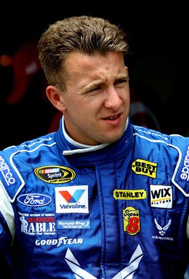 CHARLOTTE, NC - MAY 28:  A.J. Allmendinger, driver of the #43 U.S. Air Force Ford, sits in the garage area during practice for the NASCAR Sprint Cup Series Coca-Cola 600 at Charlotte Motor Speedway on May 28, 2011 in Charlotte, North Carolina.  (Photo by 