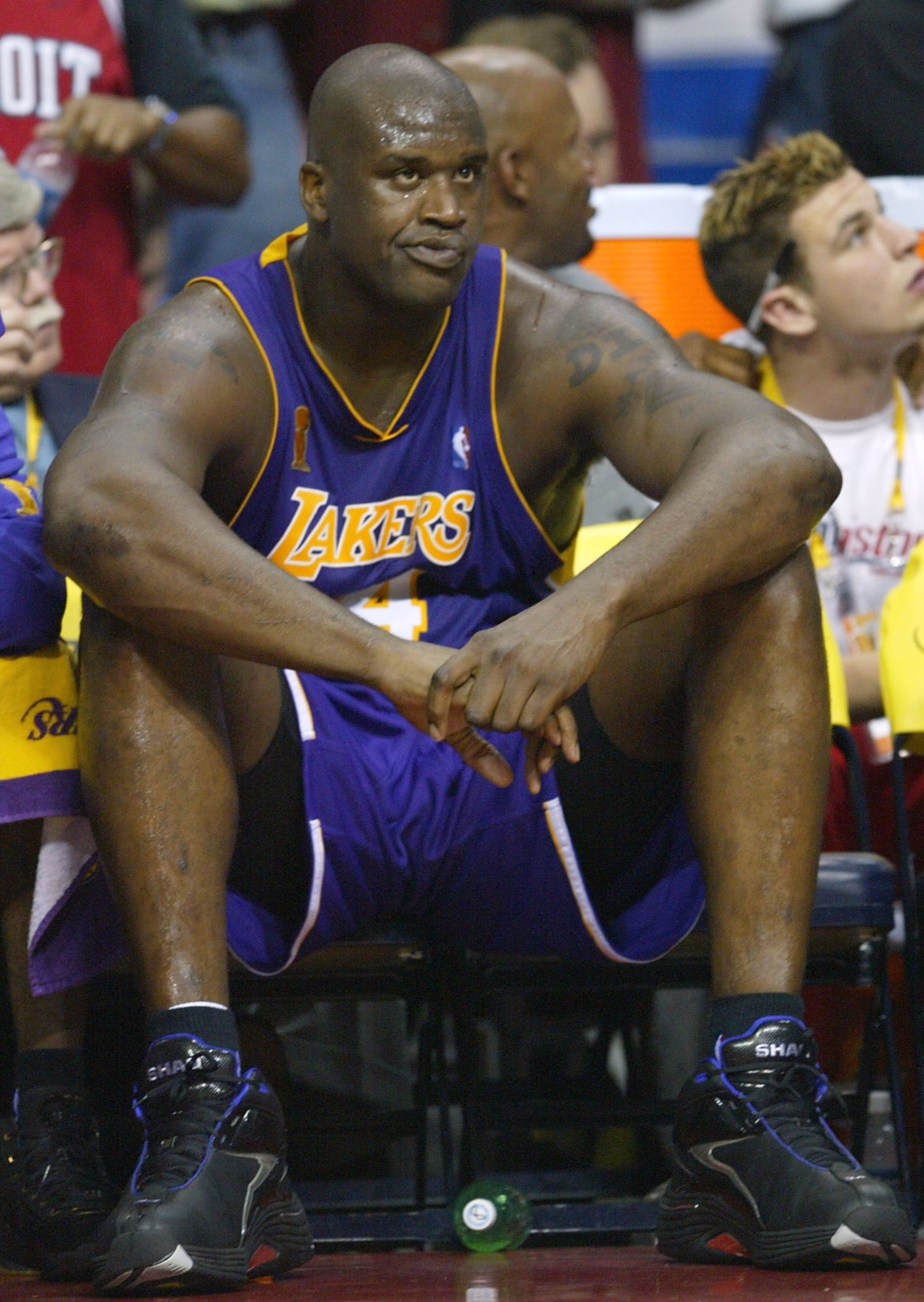 AUBURN HILLS, MI - JUNE 15: Shaquille O'Neal #34 of the Los Angeles Lakers looks on from the bench in the fourth quarter of game five of the 2004 NBA Finals against the Detroit Pistons on June 15, 2004 at The Palace of Auburn Hills in Auburn Hills, Michi AUBURN HILLS, MI - JUNE 15: Shaquille O'Neal #34 of the Los Angeles Lakers looks on from the bench in the fourth quarter of game five of the 2004 NBA Finals against the Detroit Pistons on June 15, 2004 at The Palace of Auburn Hills in Auburn Hills, Michi