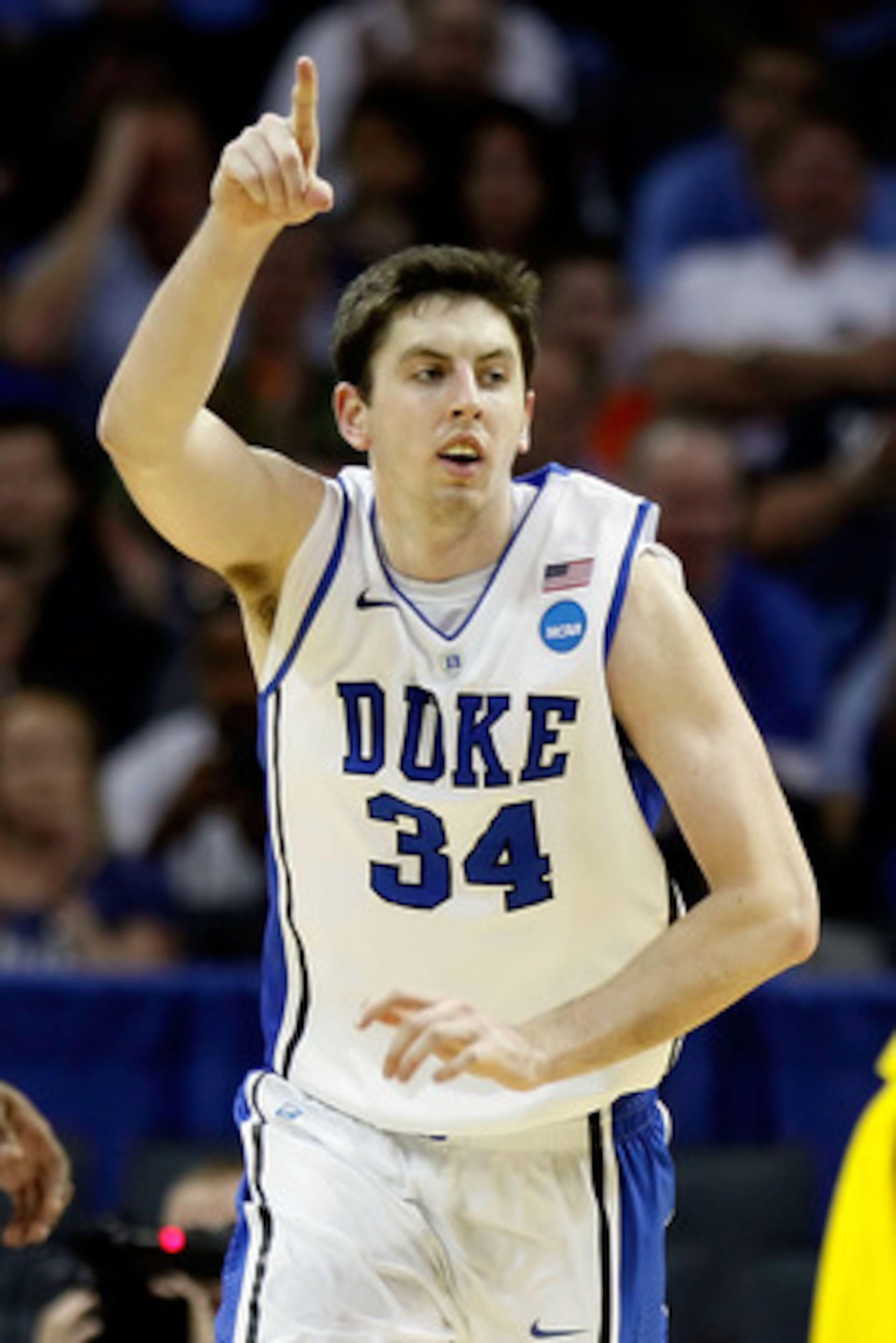 CHARLOTTE, NC - MARCH 20:  Ryan Kelly #34 of the Duke Blue Devils reacts in the second half while taking on the Michigan Wolverines during the third round of the 2011 NCAA men's basketball tournament at Time Warner Cable Arena on March 20, 2011 in Charlot