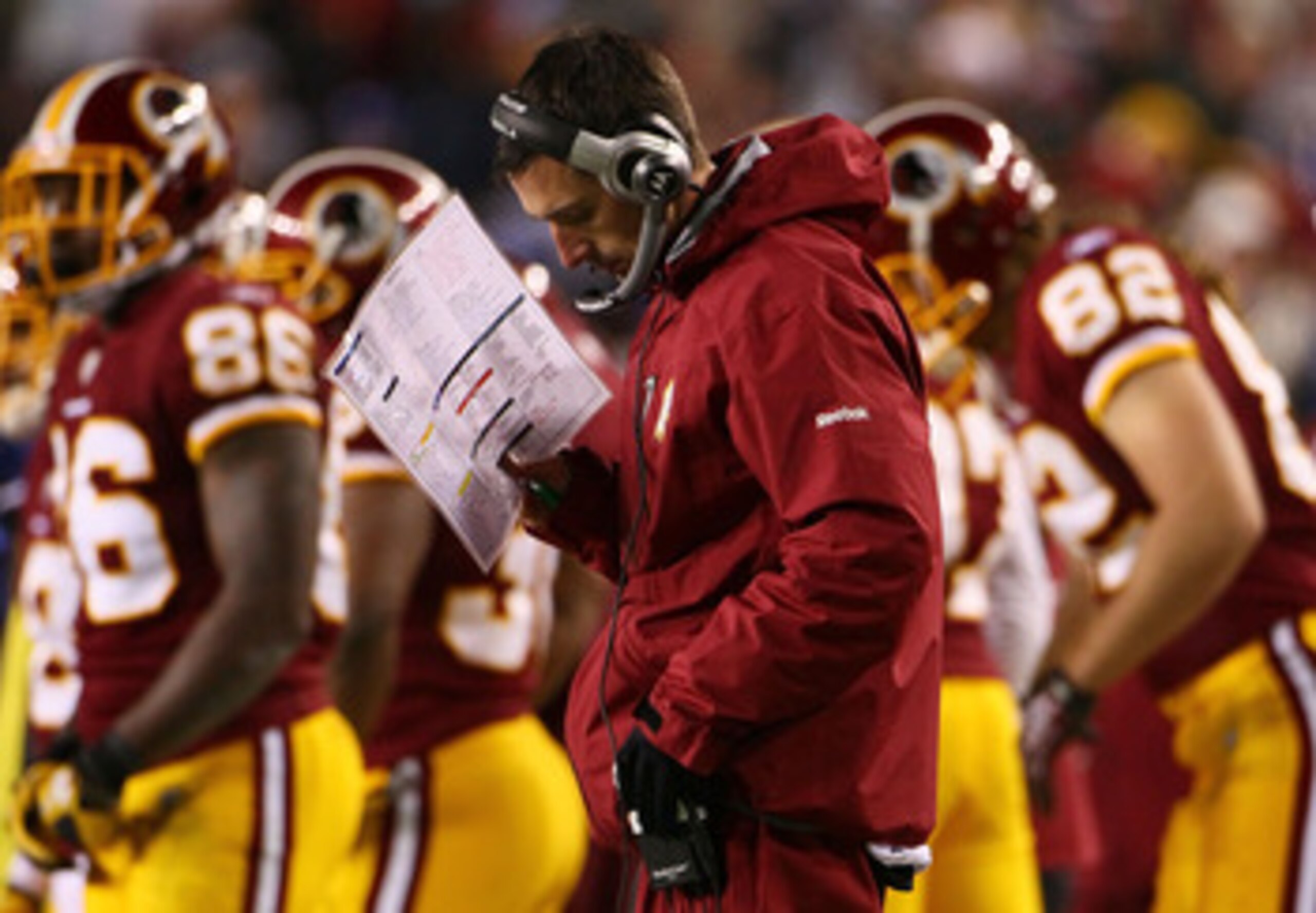 LANDOVER, MD - JANUARY 02:  Washington Redskins offensive coordinator Kyle Shanahan works in the sideline in the fourth quarter of a game against the New York Giants at FedEx Field on January 2, 2011 in Landover, Maryland. The Giants won the game 17-14.  